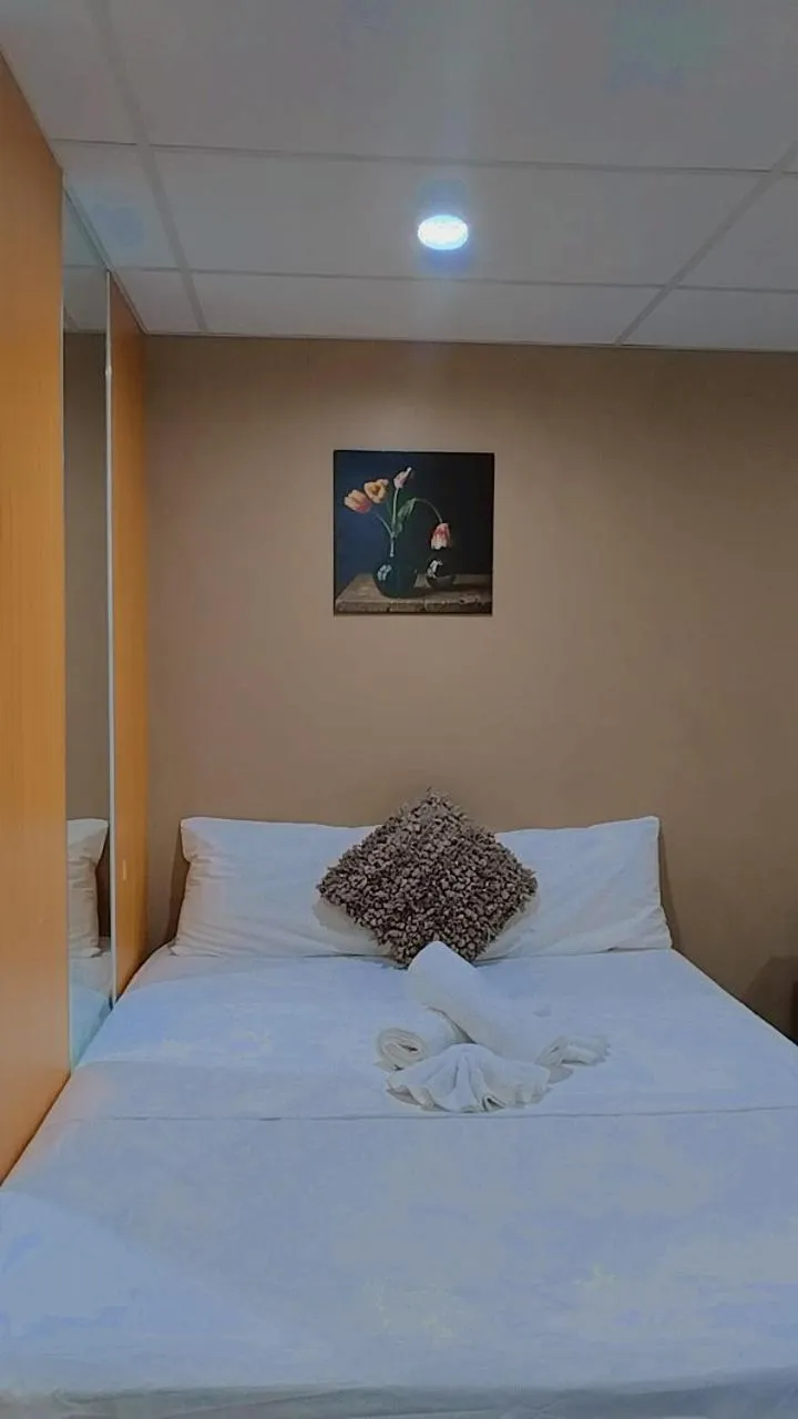 Bedroom in Smart Condominium Official