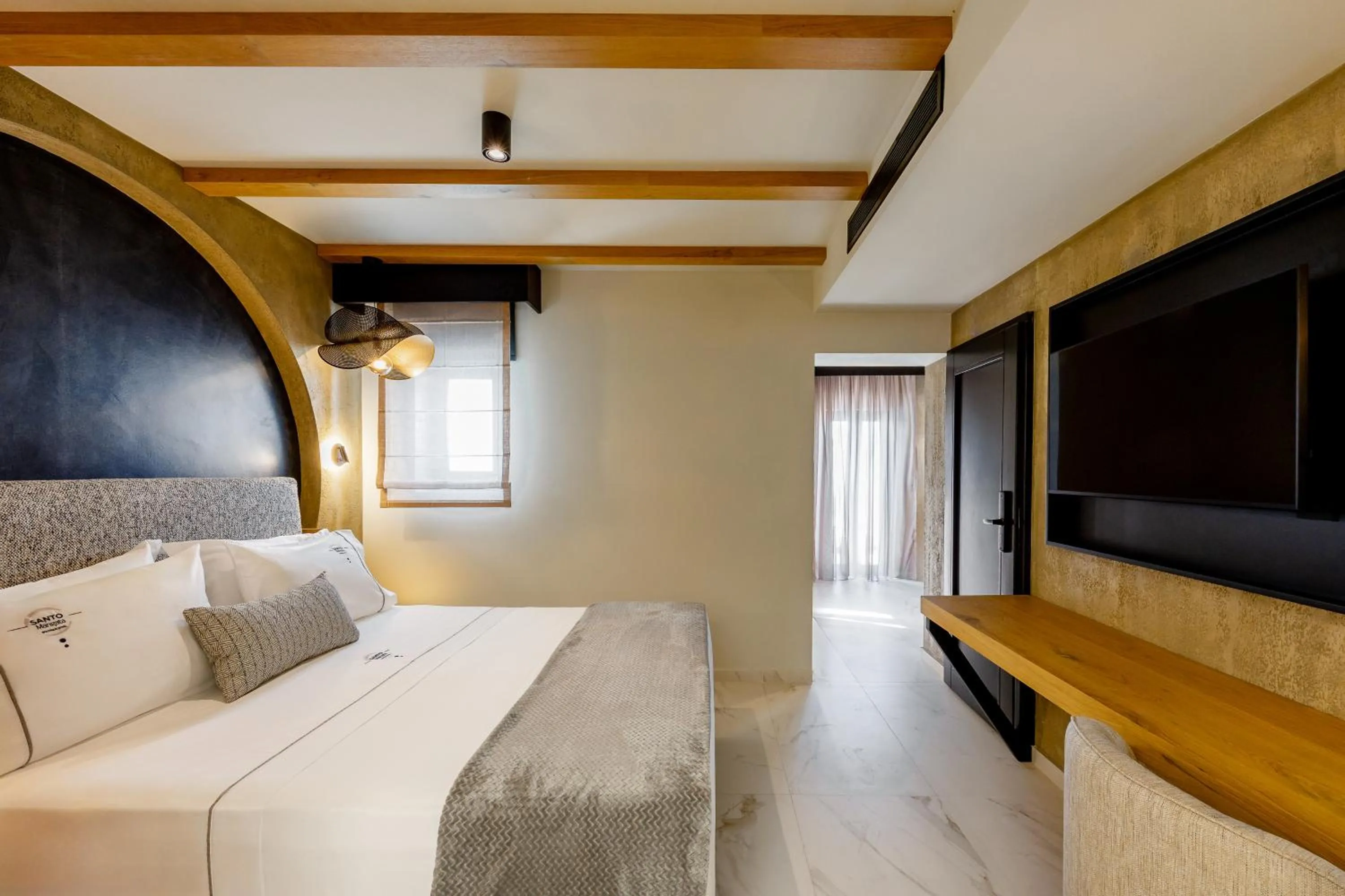Bed in Santo Mangata Boutique Hotel and Spa