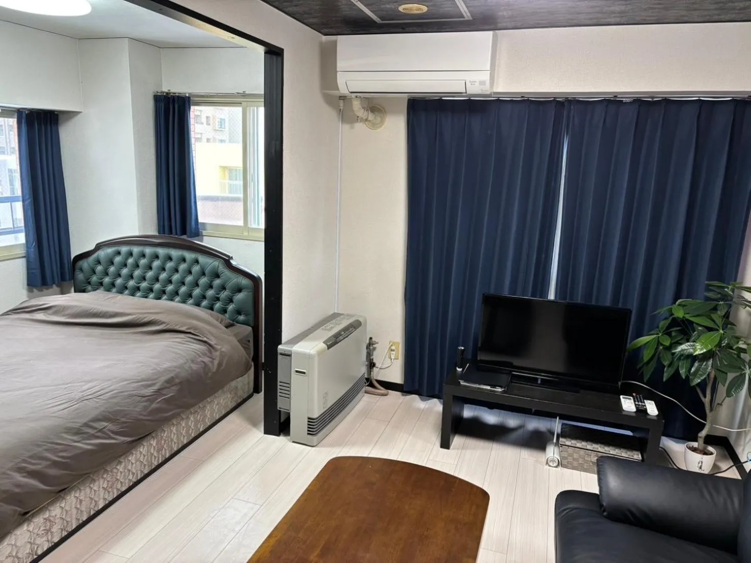 Living room, Bed in KIYAZA Space Sapporo 2