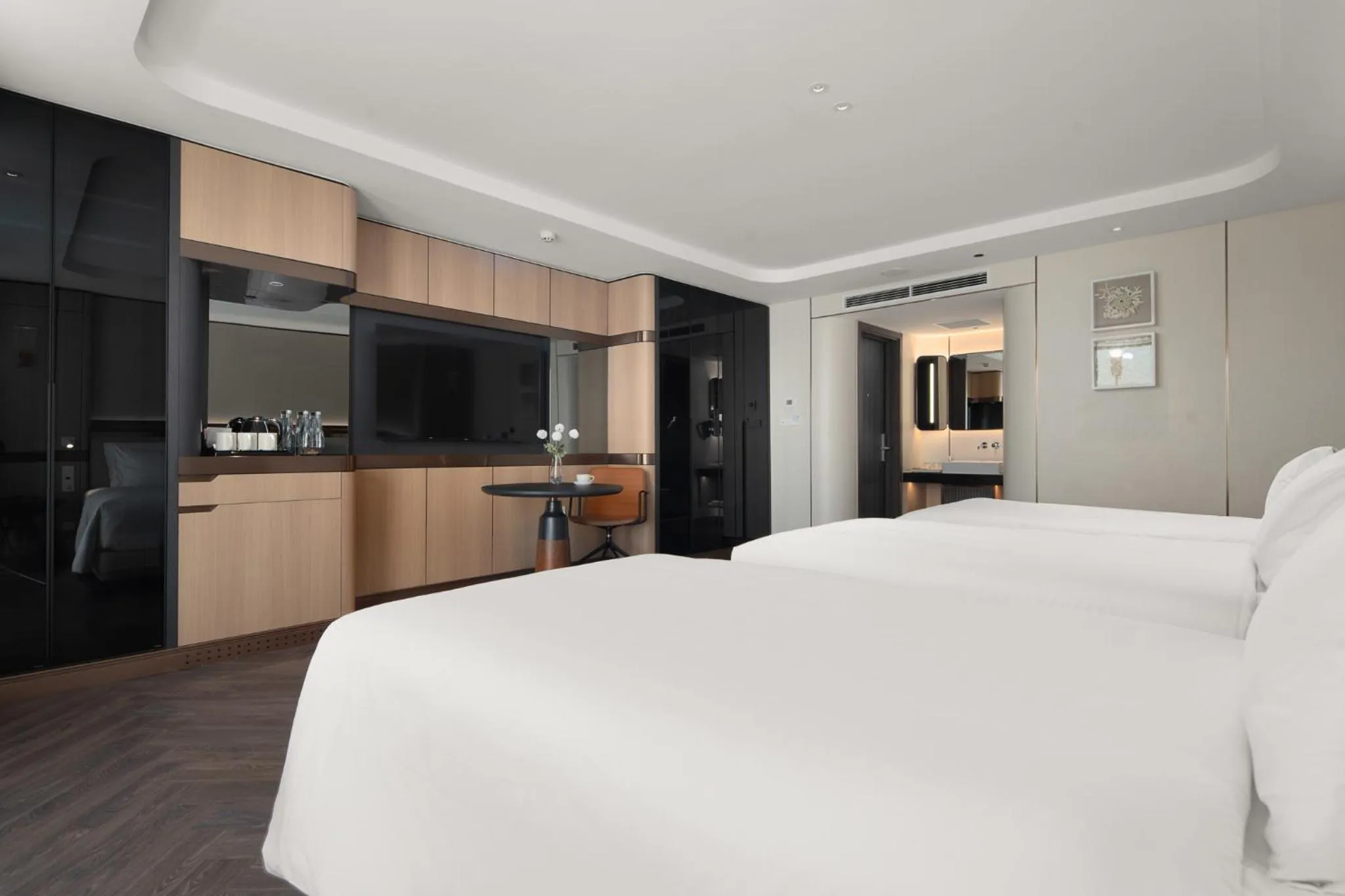 Bed in Grand Pioneers Halong Bay Cruise 1