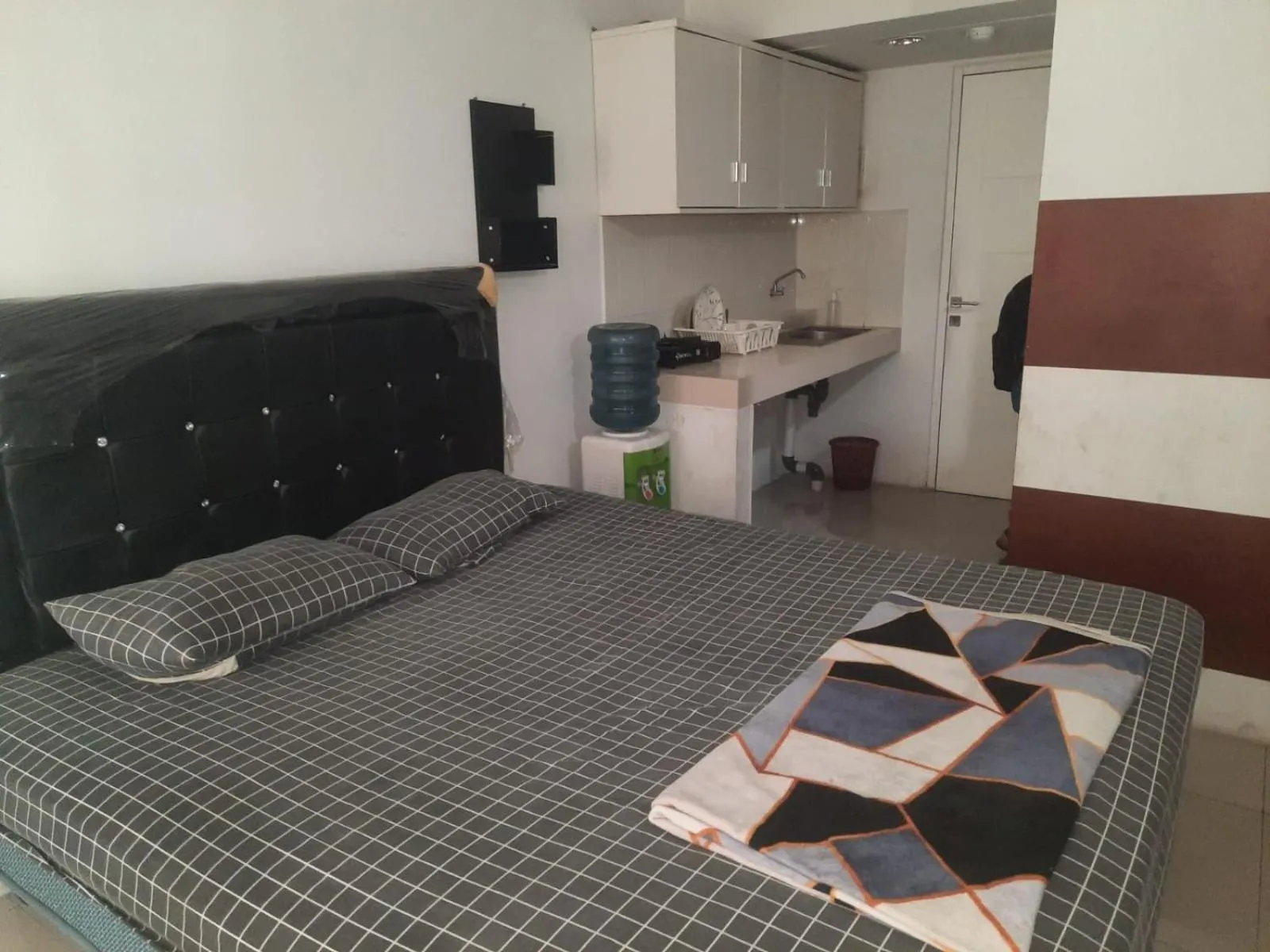 Bedroom, Bed in OYO Life 93139 Apartemen Grand Sentraland By Evi