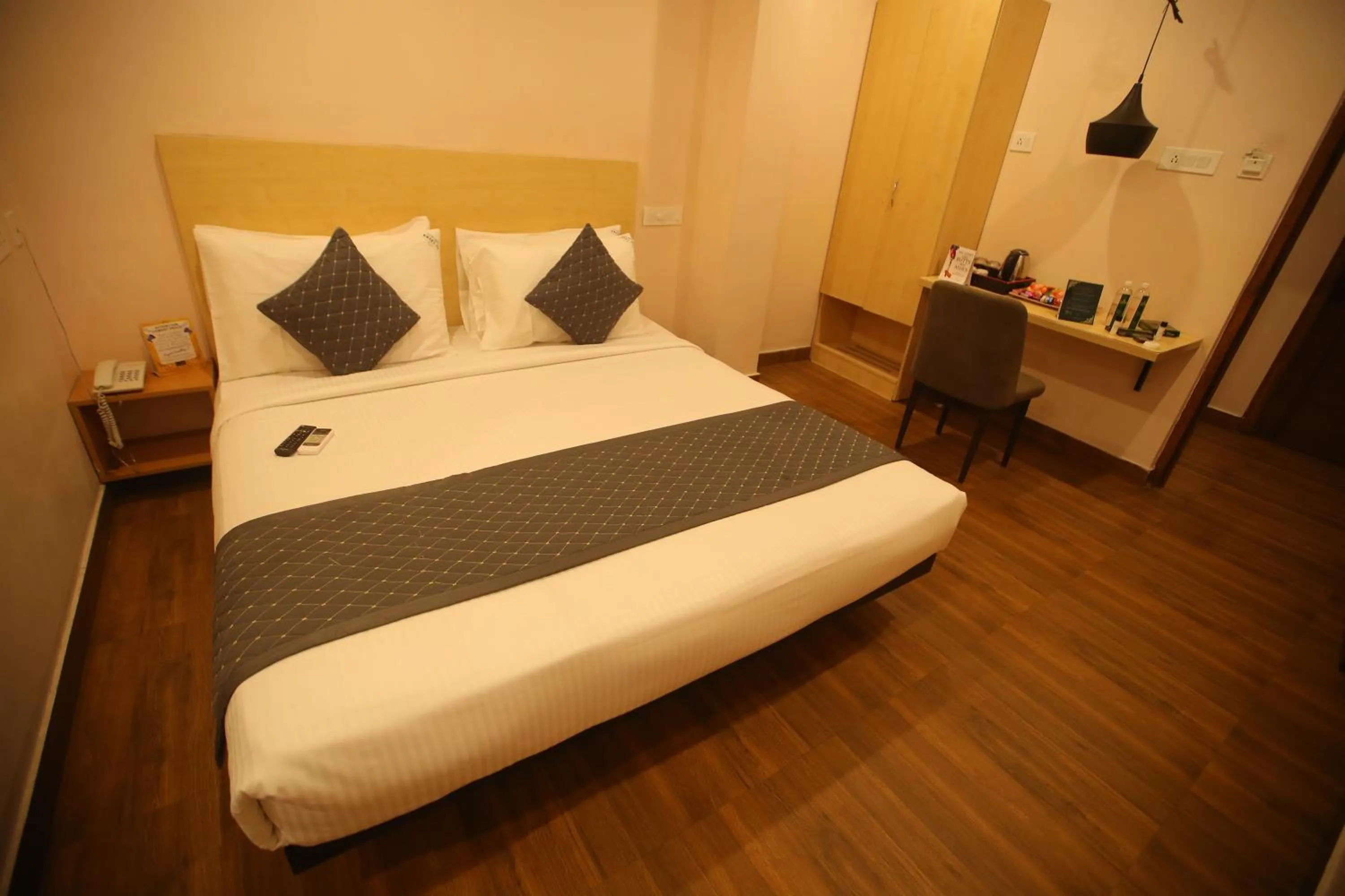 Bed in De Crown Luxury Hotel