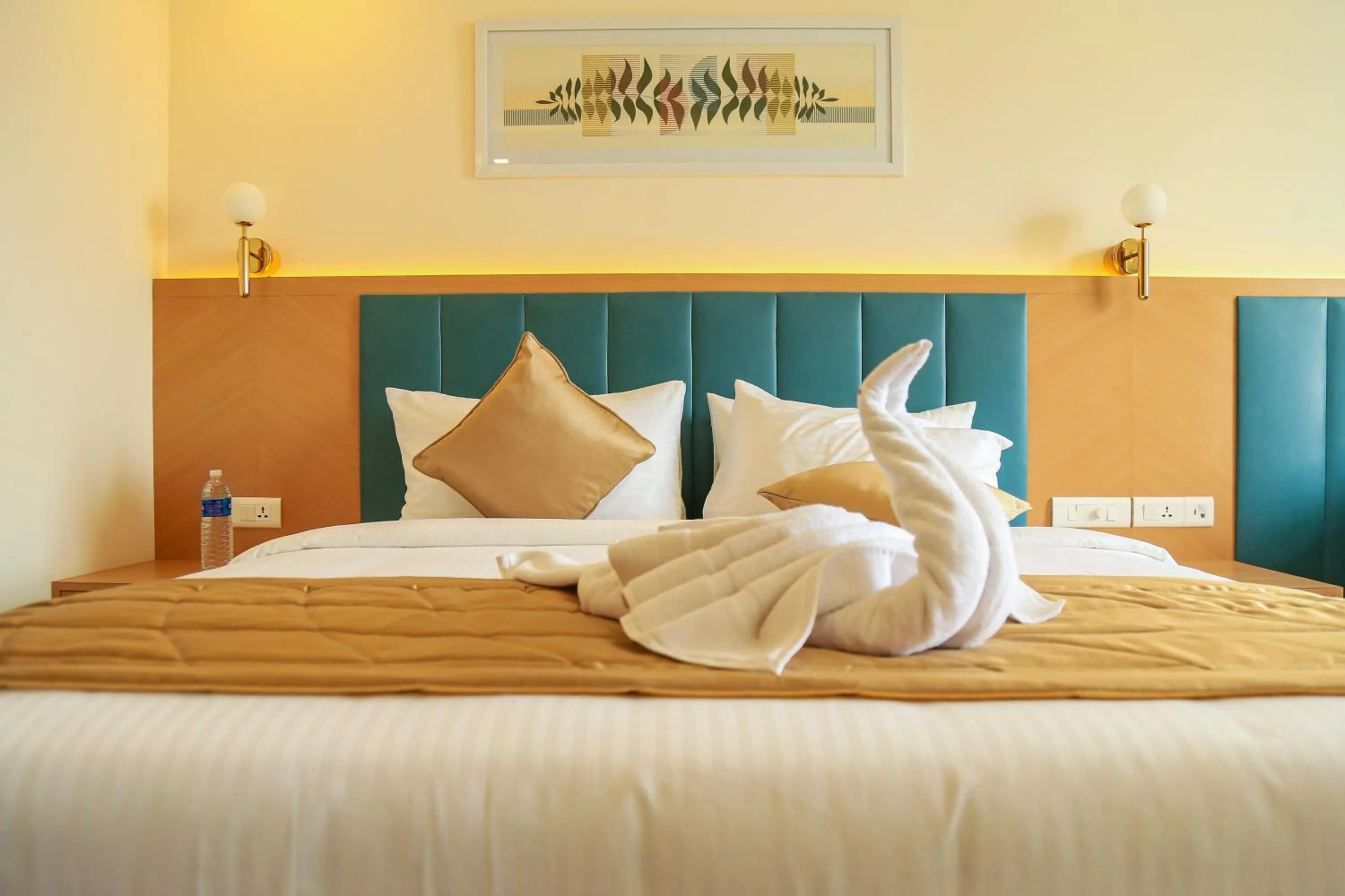 Bed in Hotel Turmeric