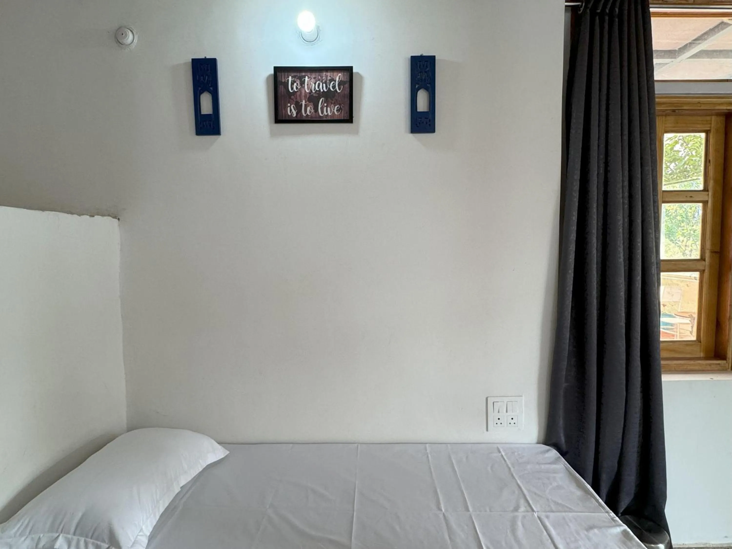 Bed in Wanderlust Mukteshwar