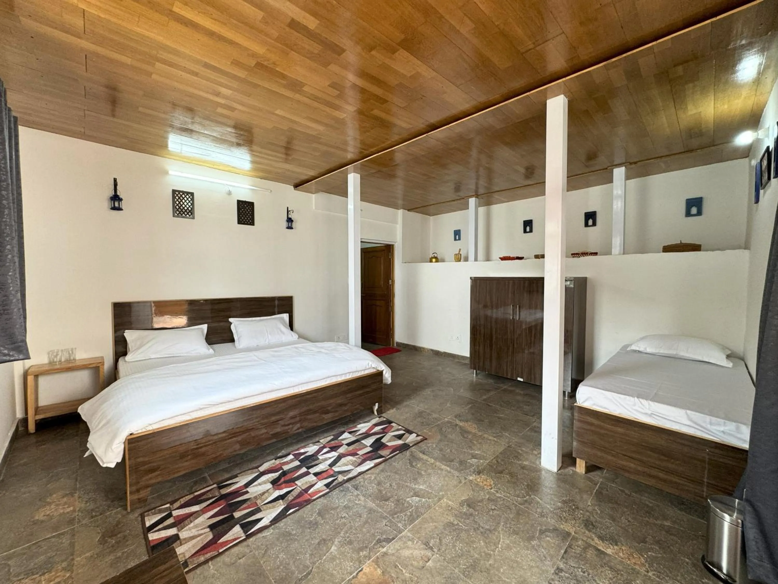 Bed in Wanderlust Mukteshwar