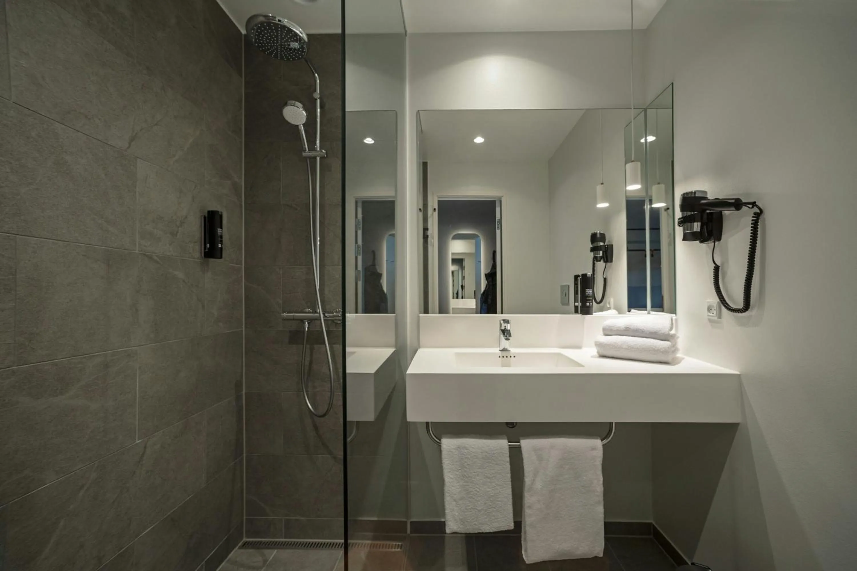 Bathroom in Four Points Flex by Sheraton Horsens