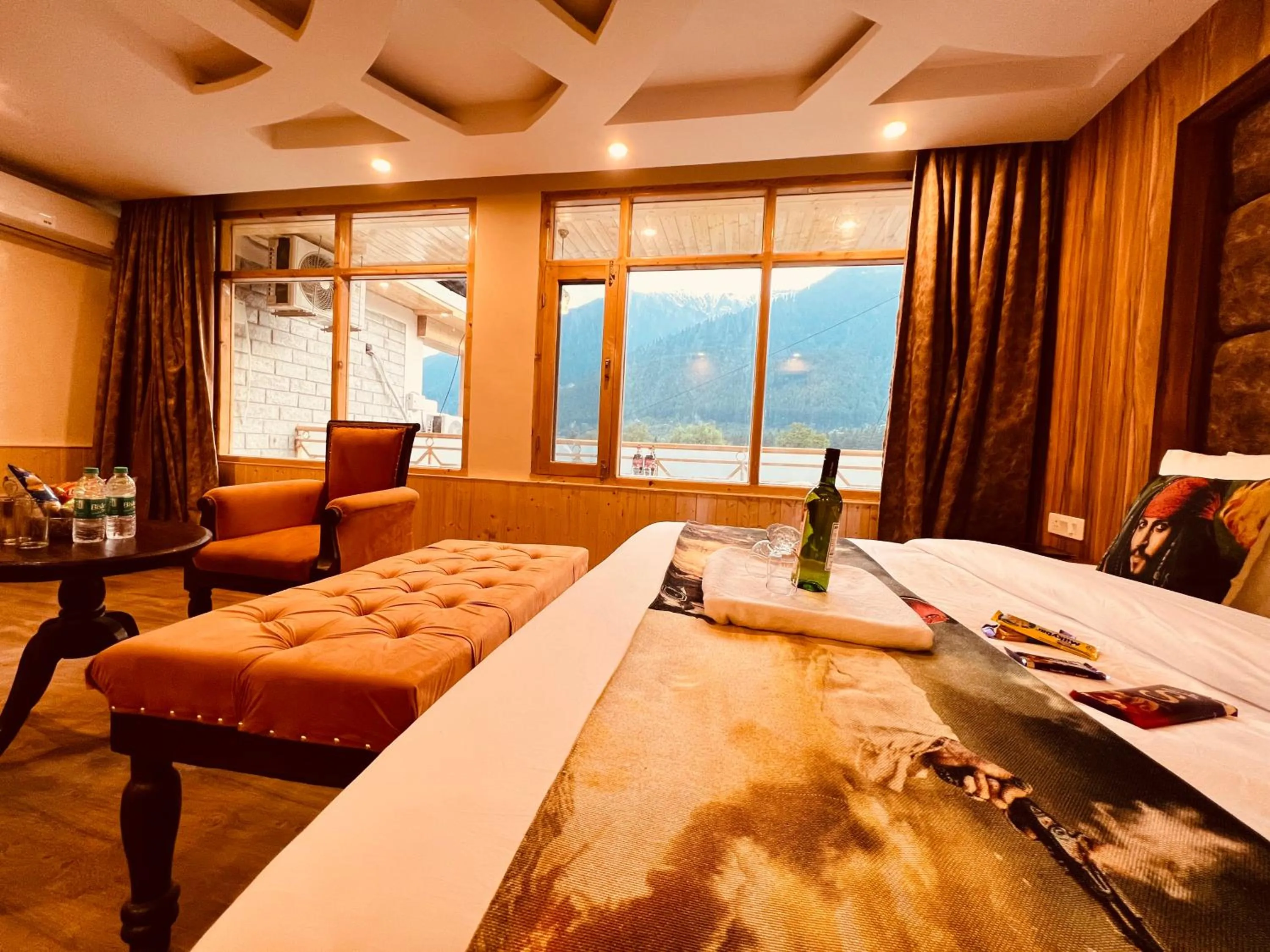 Seating area in Hill River Resort By West Western -Property of the Year 2024-25 - Central Heated & Air Cooled, Near Mall Road