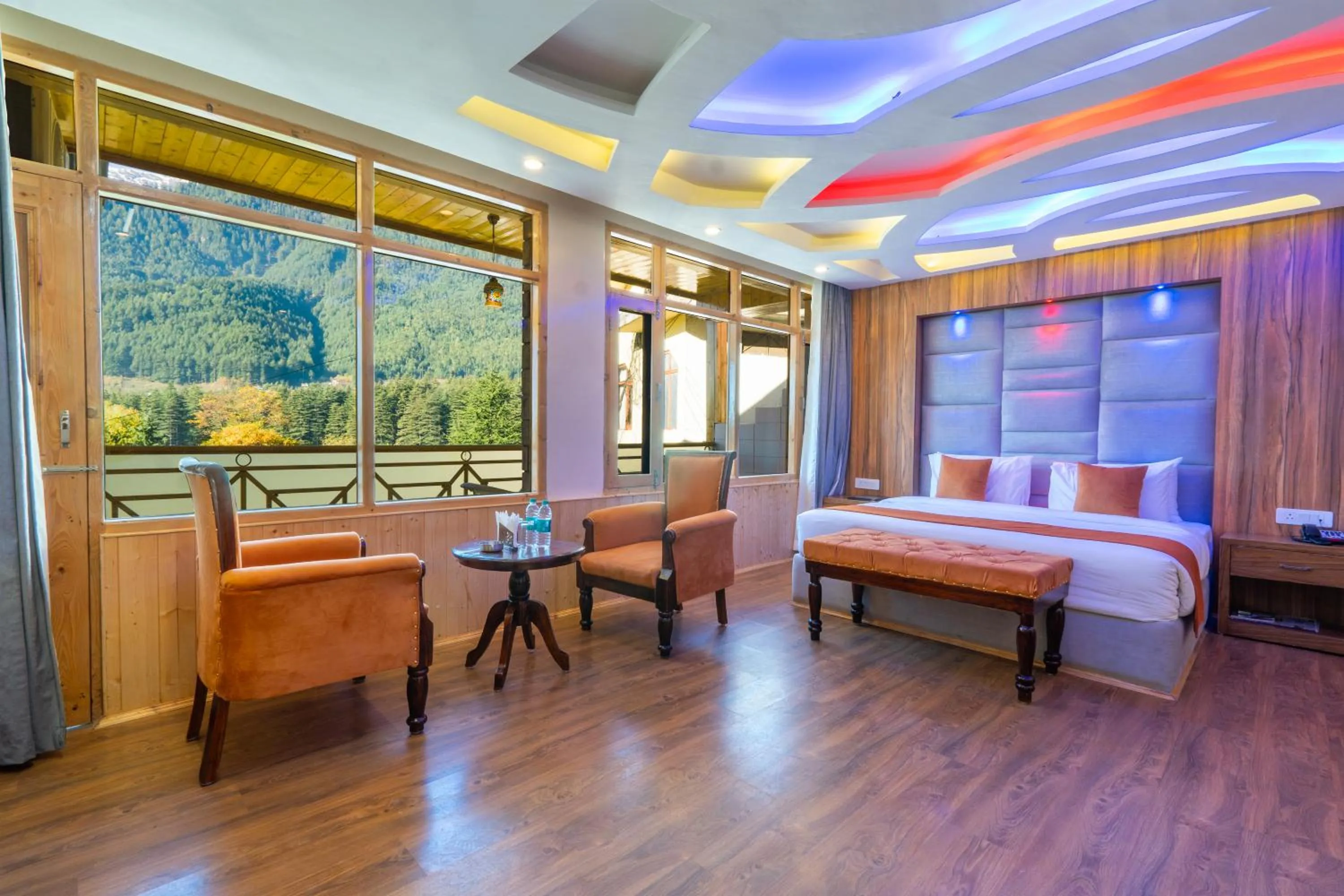 Seating area, Bed in Hill River Resort By West Western -Property of the Year 2024-25 - Central Heated & Air Cooled, Near Mall Road