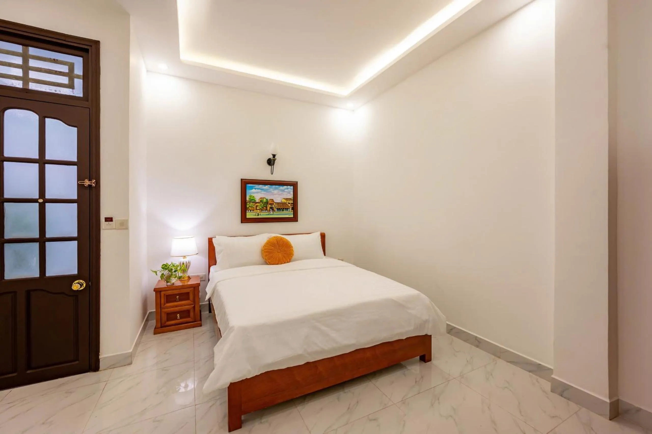 Bed in Golden Sun Hotel Hoi An