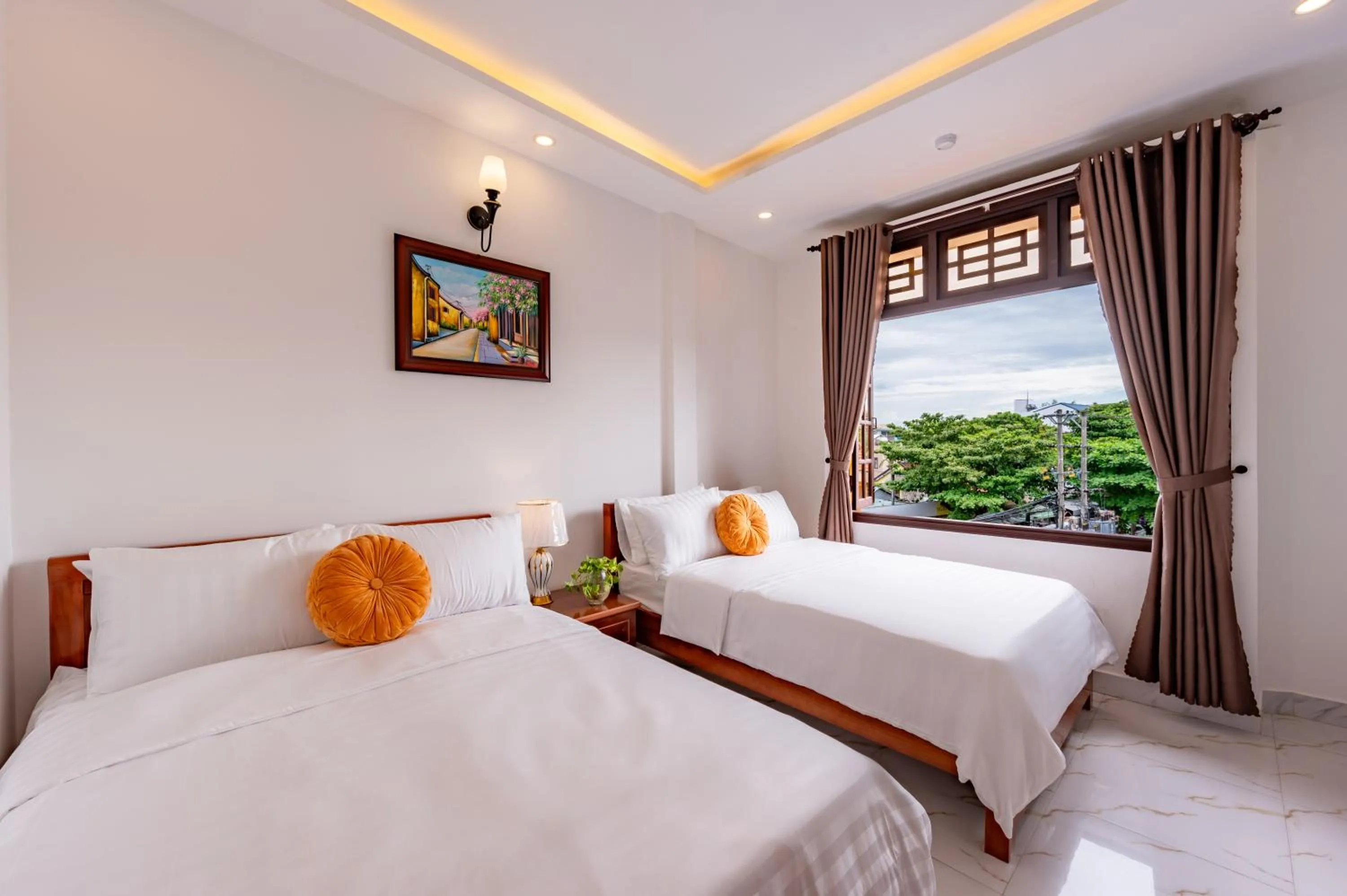 Bed in Golden Sun Hotel Hoi An