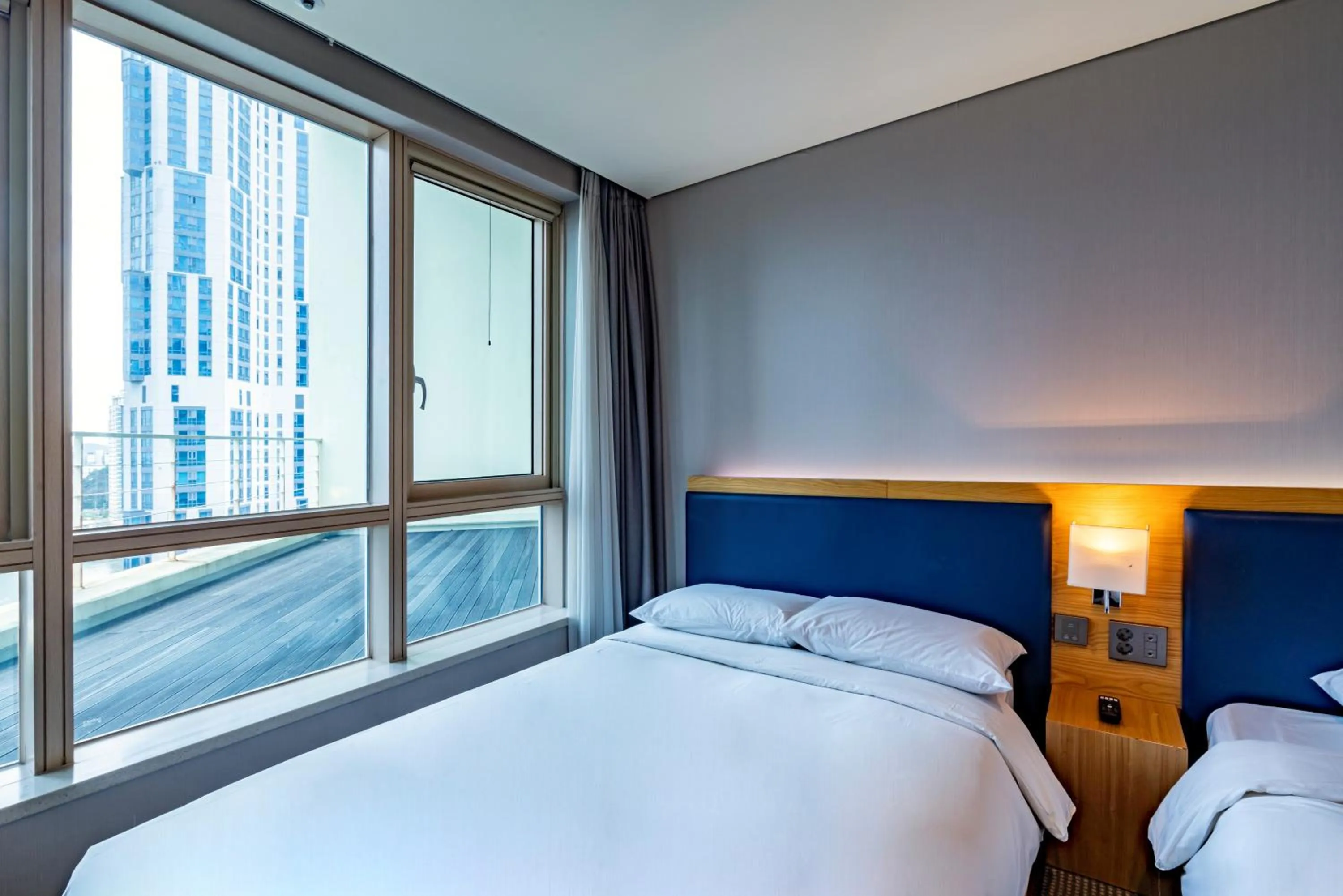 Bed in Centum Business Hotel