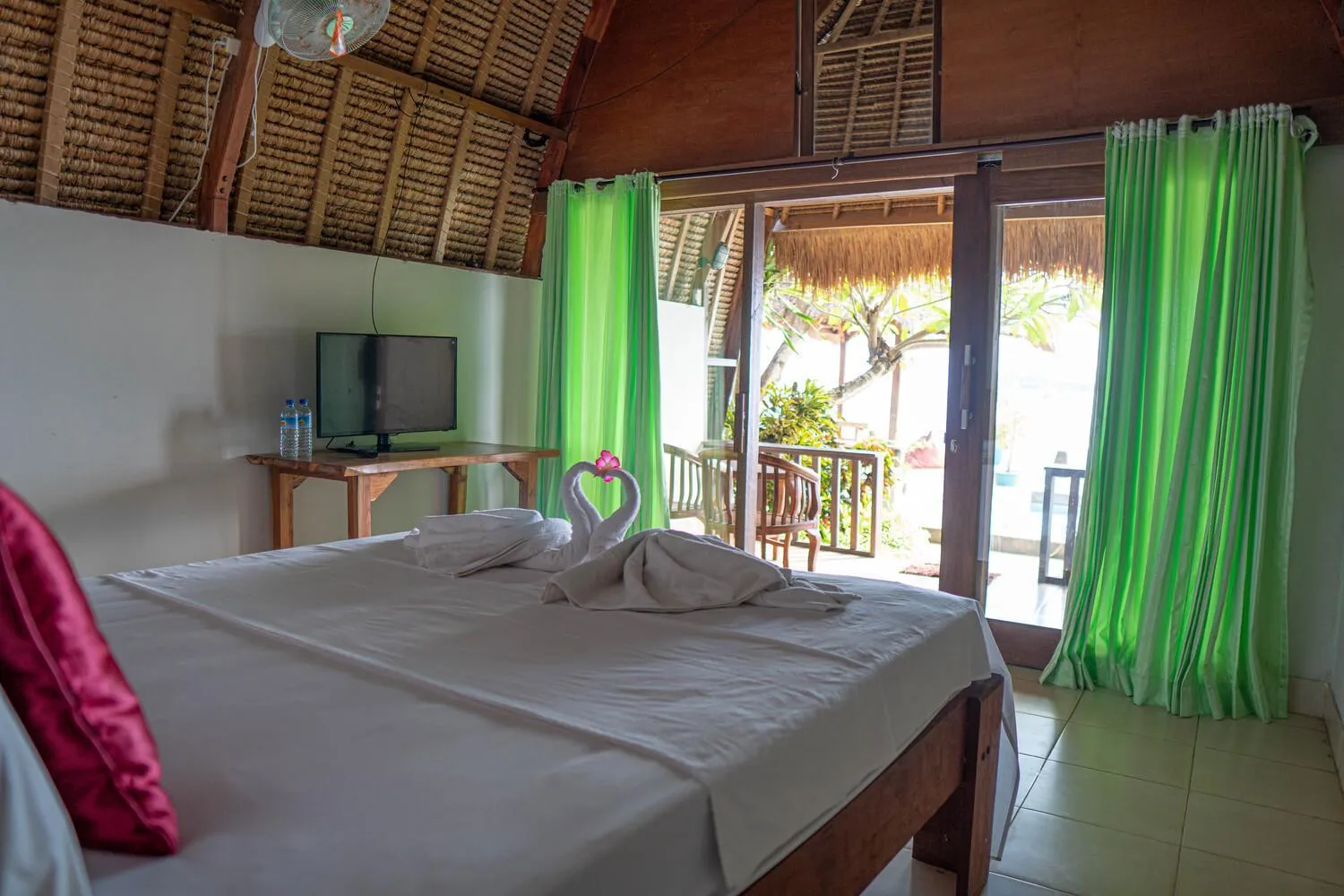 Bed in Krisna Bungalows and Restaurant