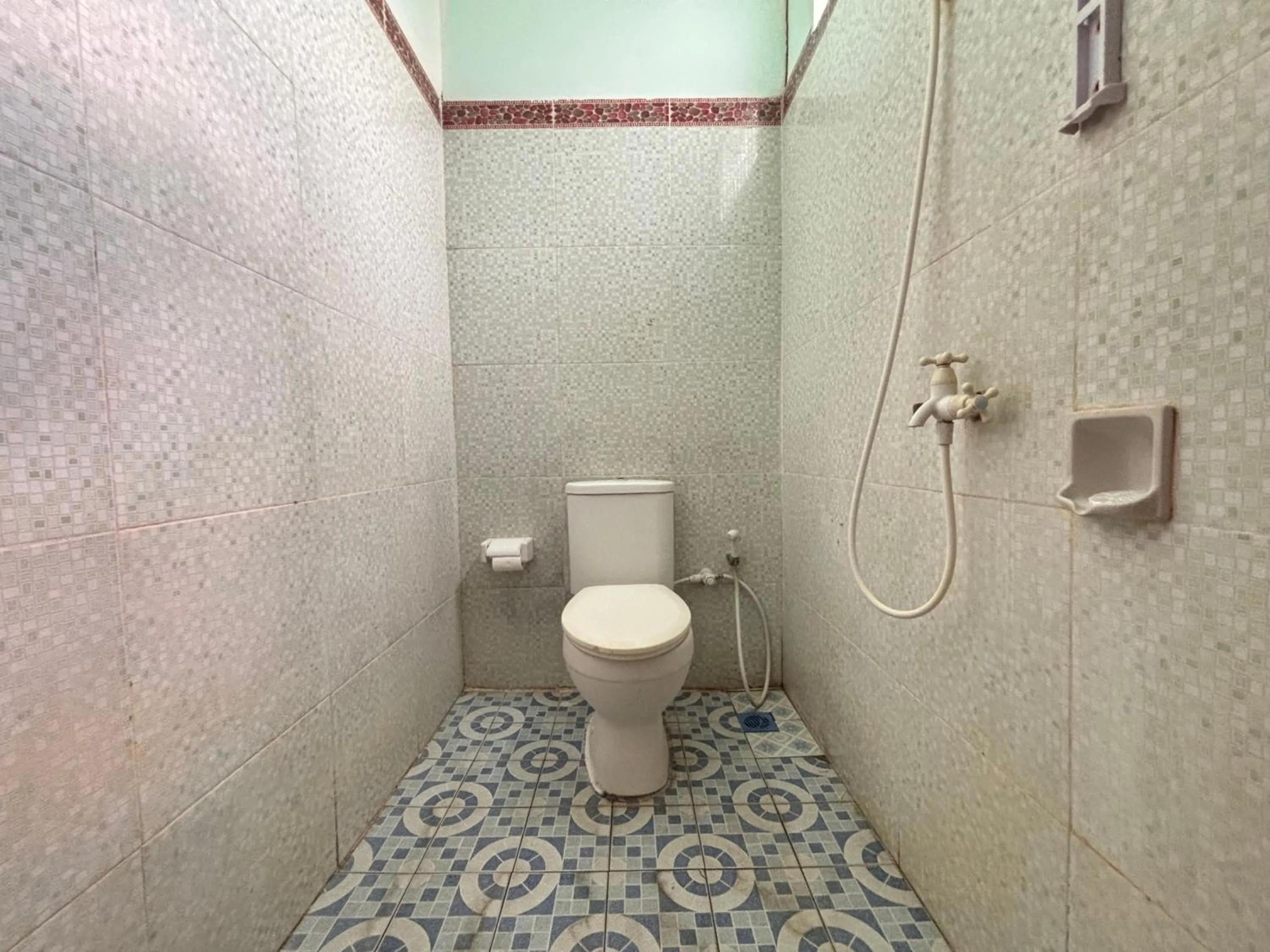 Toilet in Krisna Bungalows and Restaurant