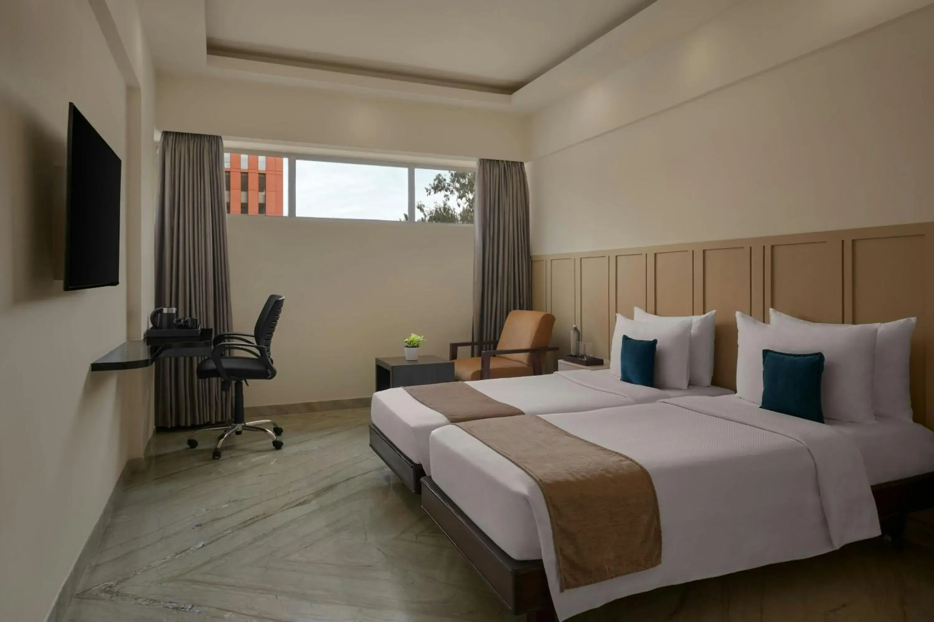 Winter Green Twin Room with City View - single occupancy in The Fern Residency Bengaluru, Yeshwanthpur, Series by Marriott Winter Green Twin Room with City View - single occupancy in The Fern Residency Bengaluru, Yeshwanthpur, Series by Marriott