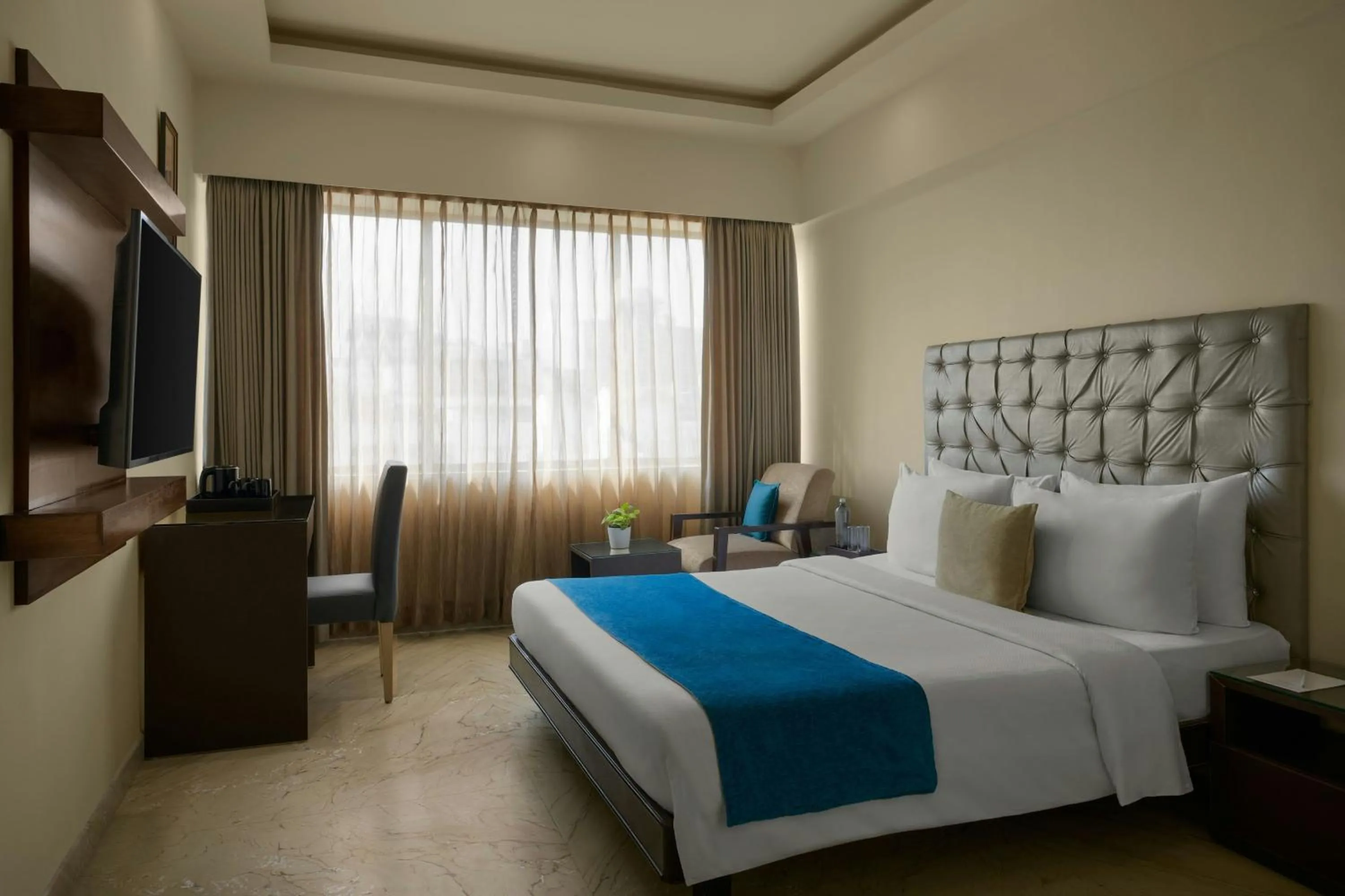 Winter Green Premium Queen Room with City View - single occupancy in The Fern Residency Bengaluru, Yeshwanthpur, Series by Marriott