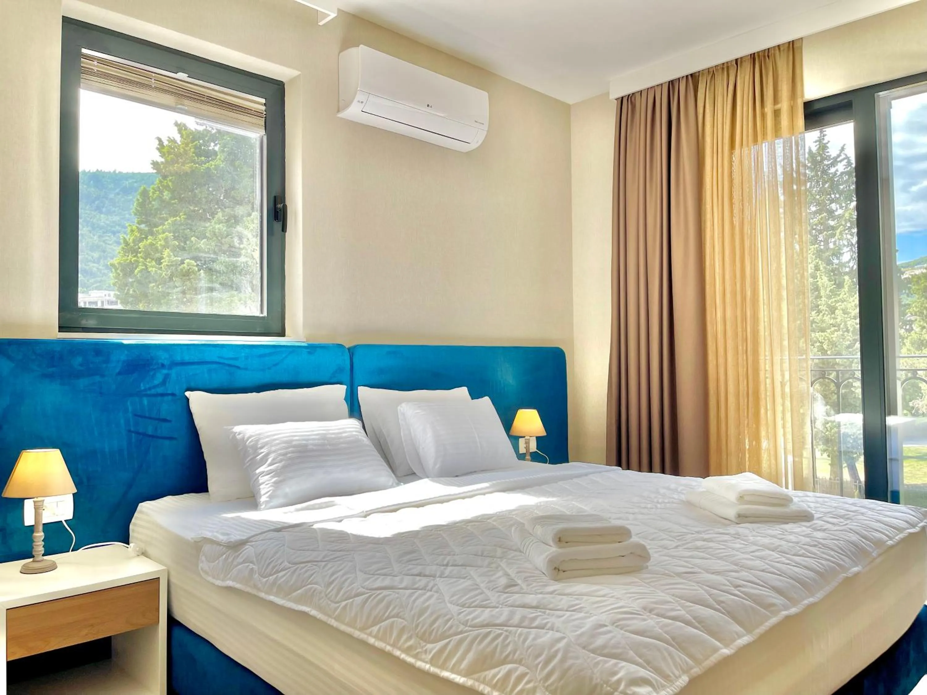 Bed in Comfort Apartments Pasha