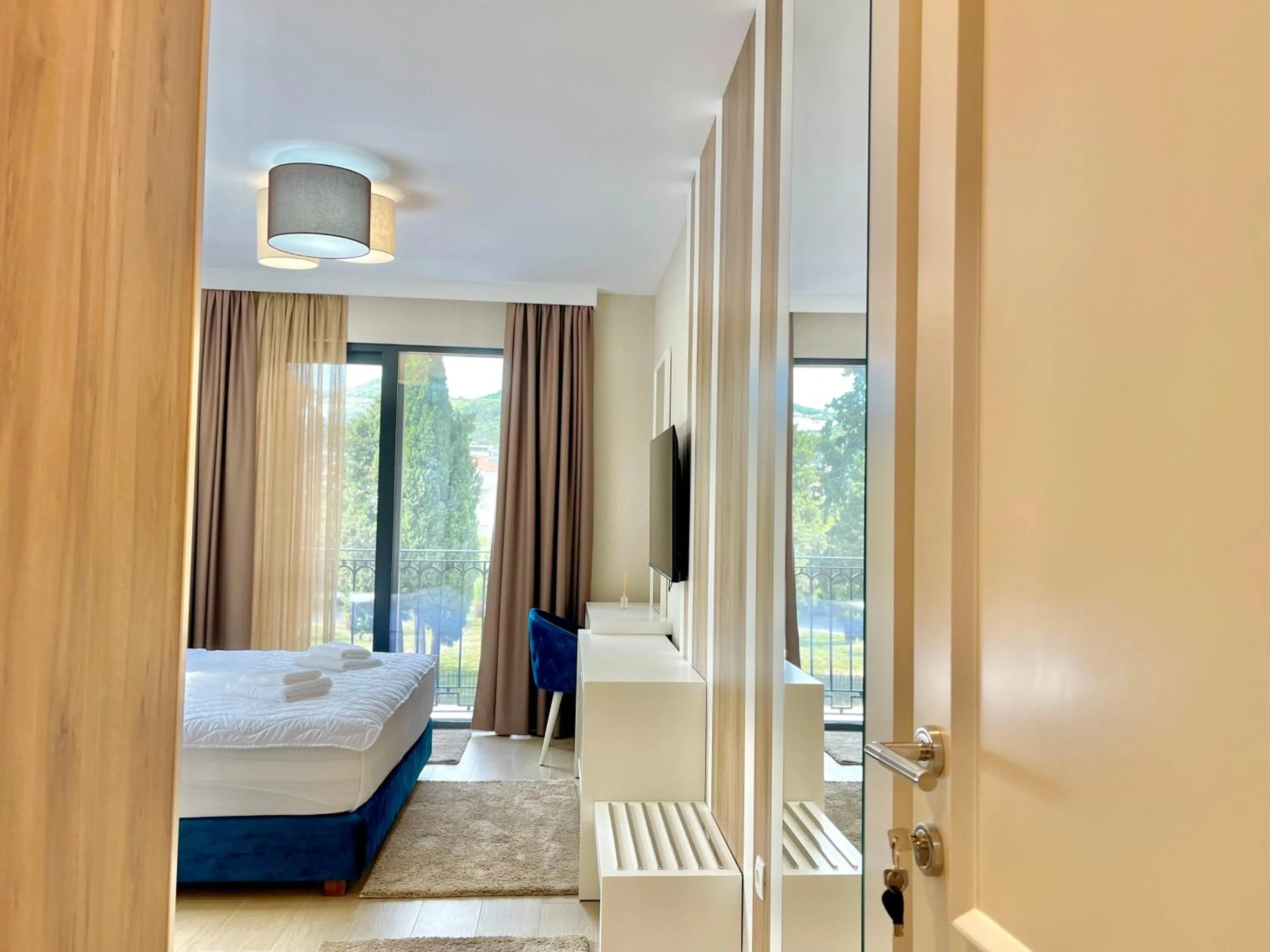 Bed in Comfort Apartments Pasha