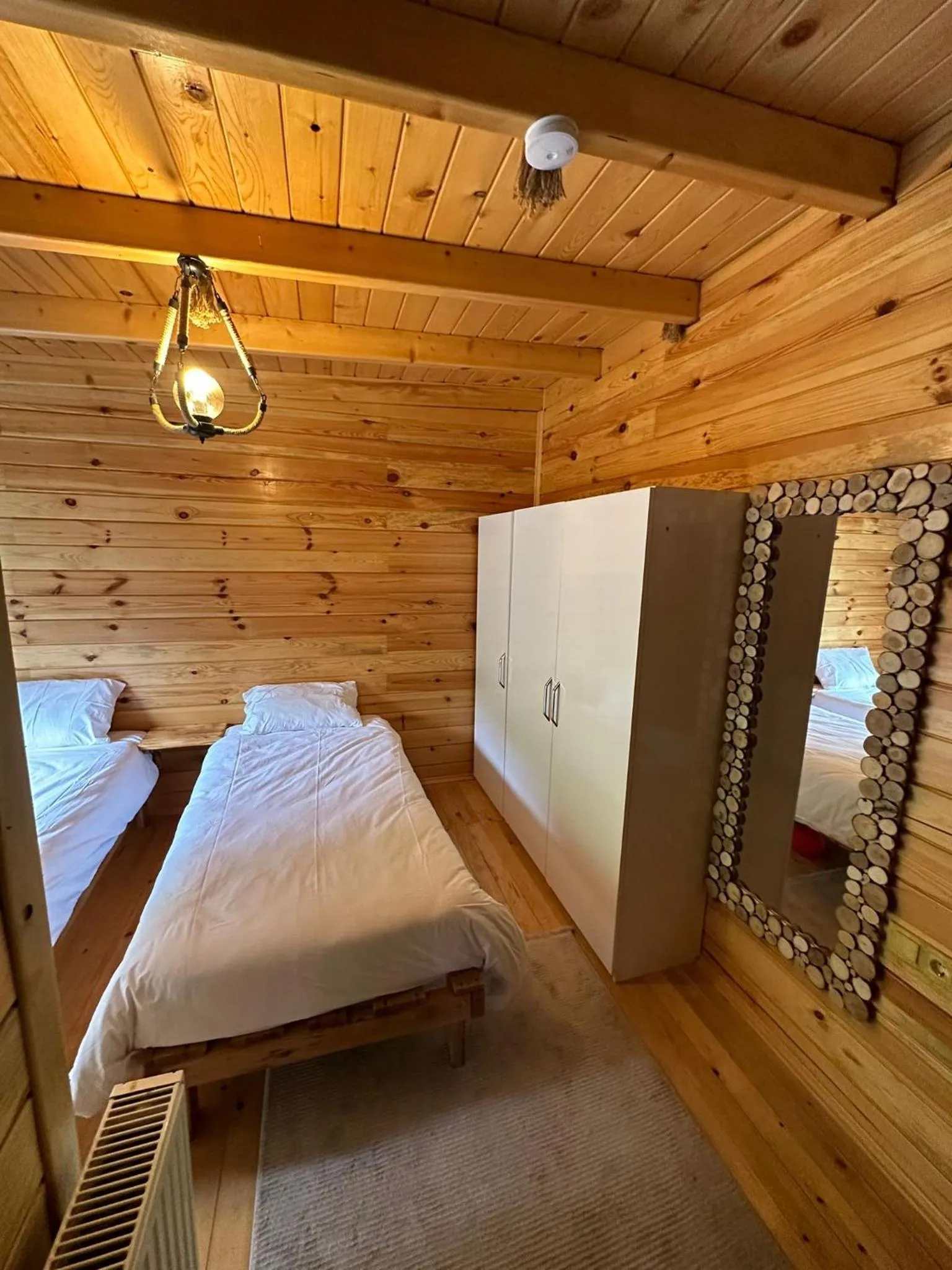 Bed in Peruma otel bungalov