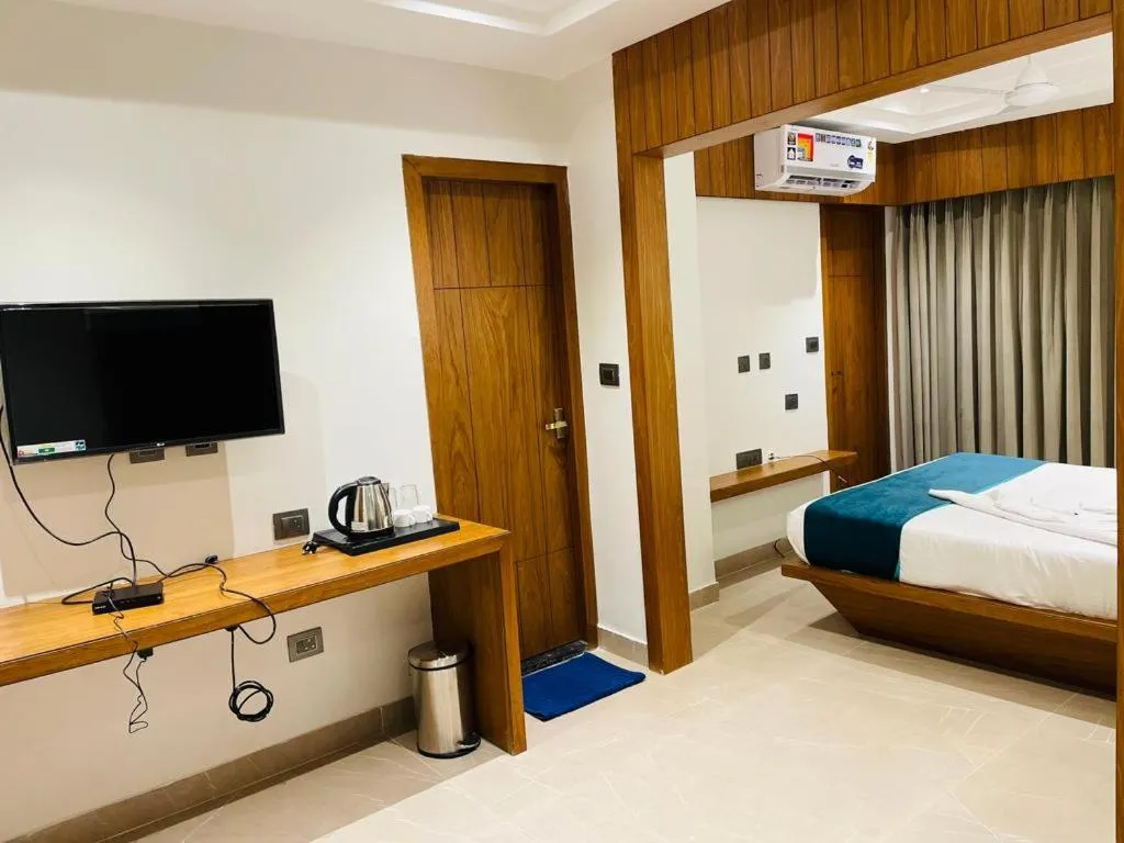 TV and multimedia, Bed in Hotel Emora Tree