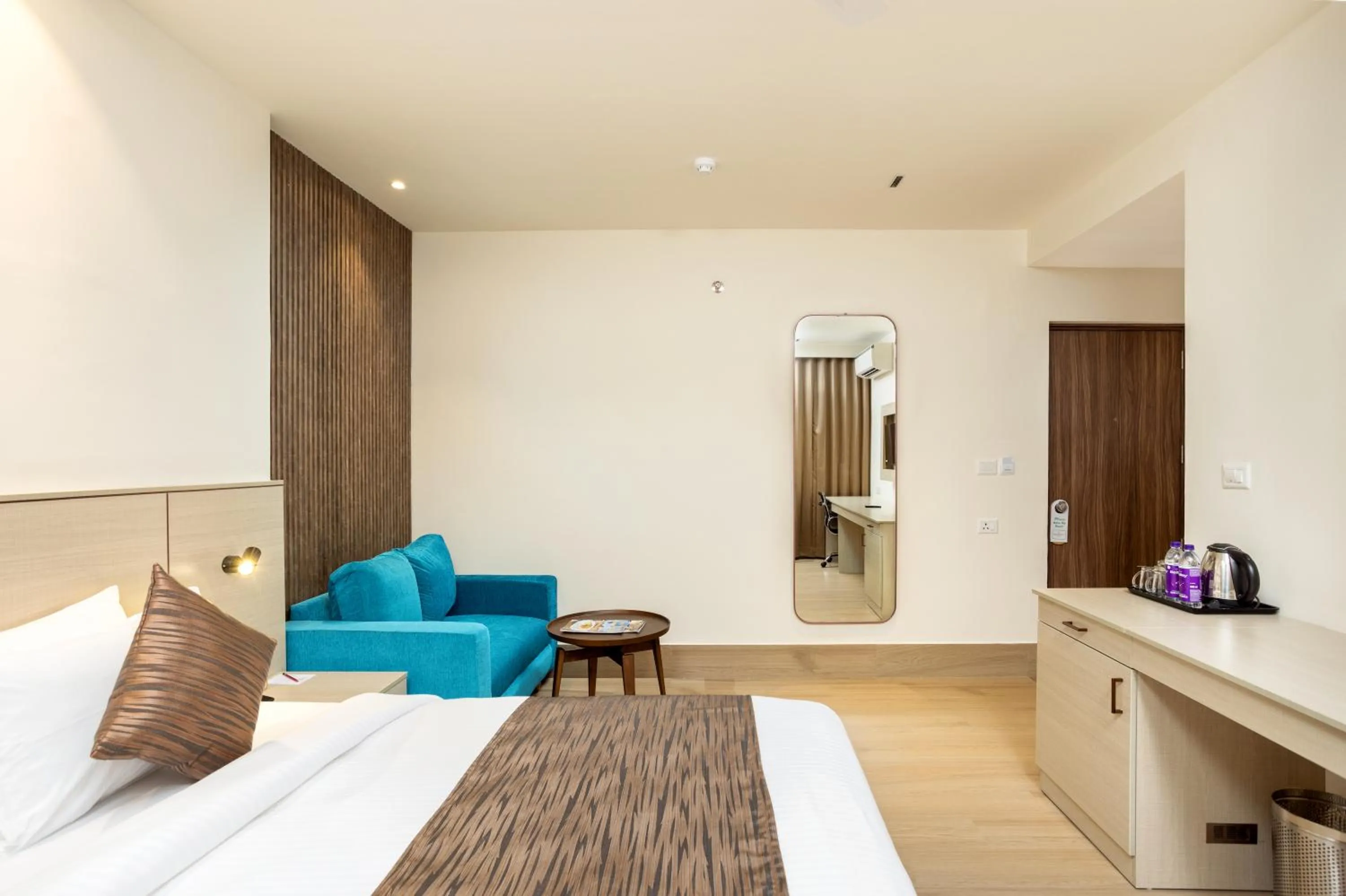 Seating area, Bed in PRESIDENCY AIRPORT HOTEL