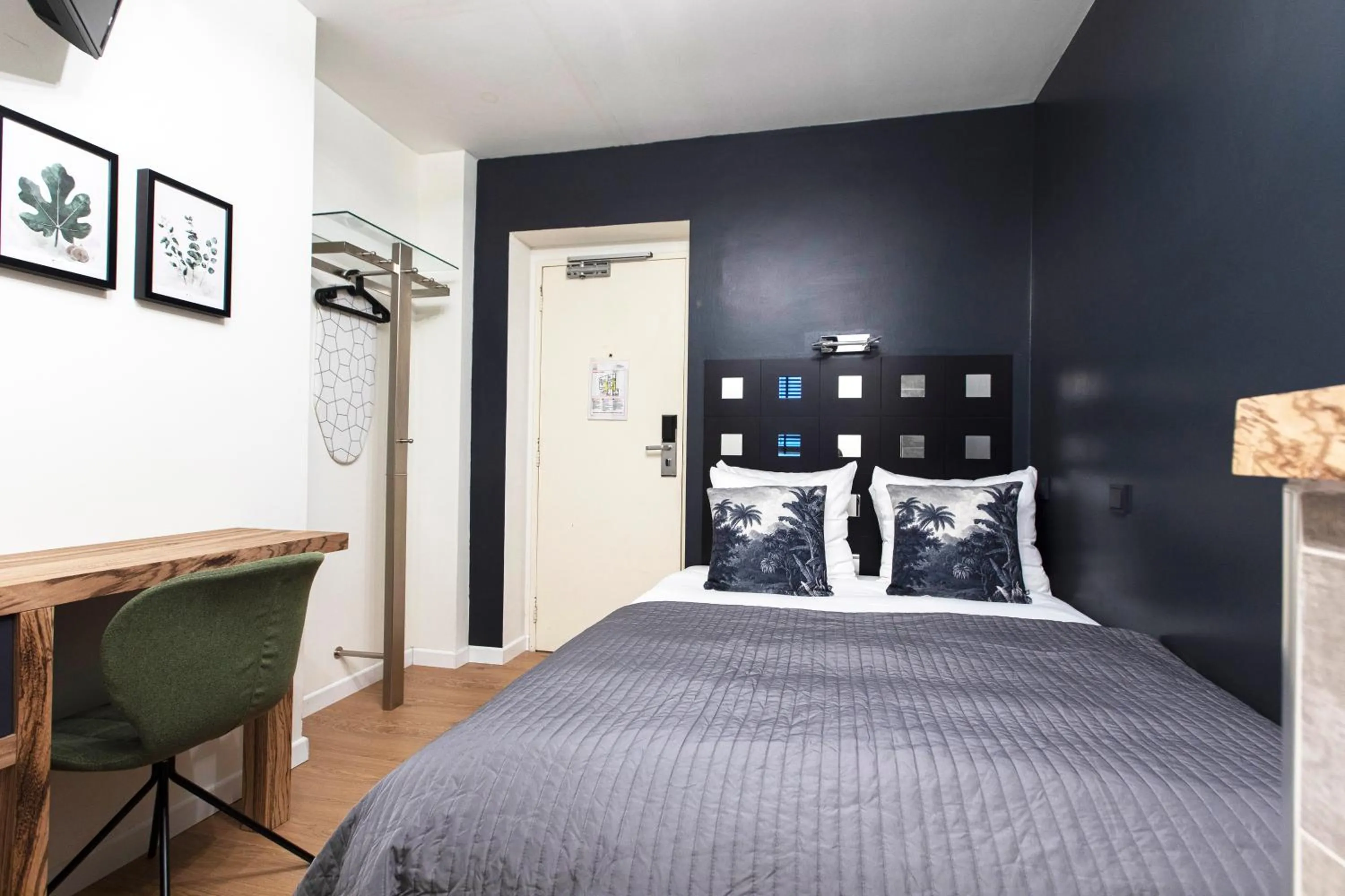 Bed in Quentin Amsterdam Hotel