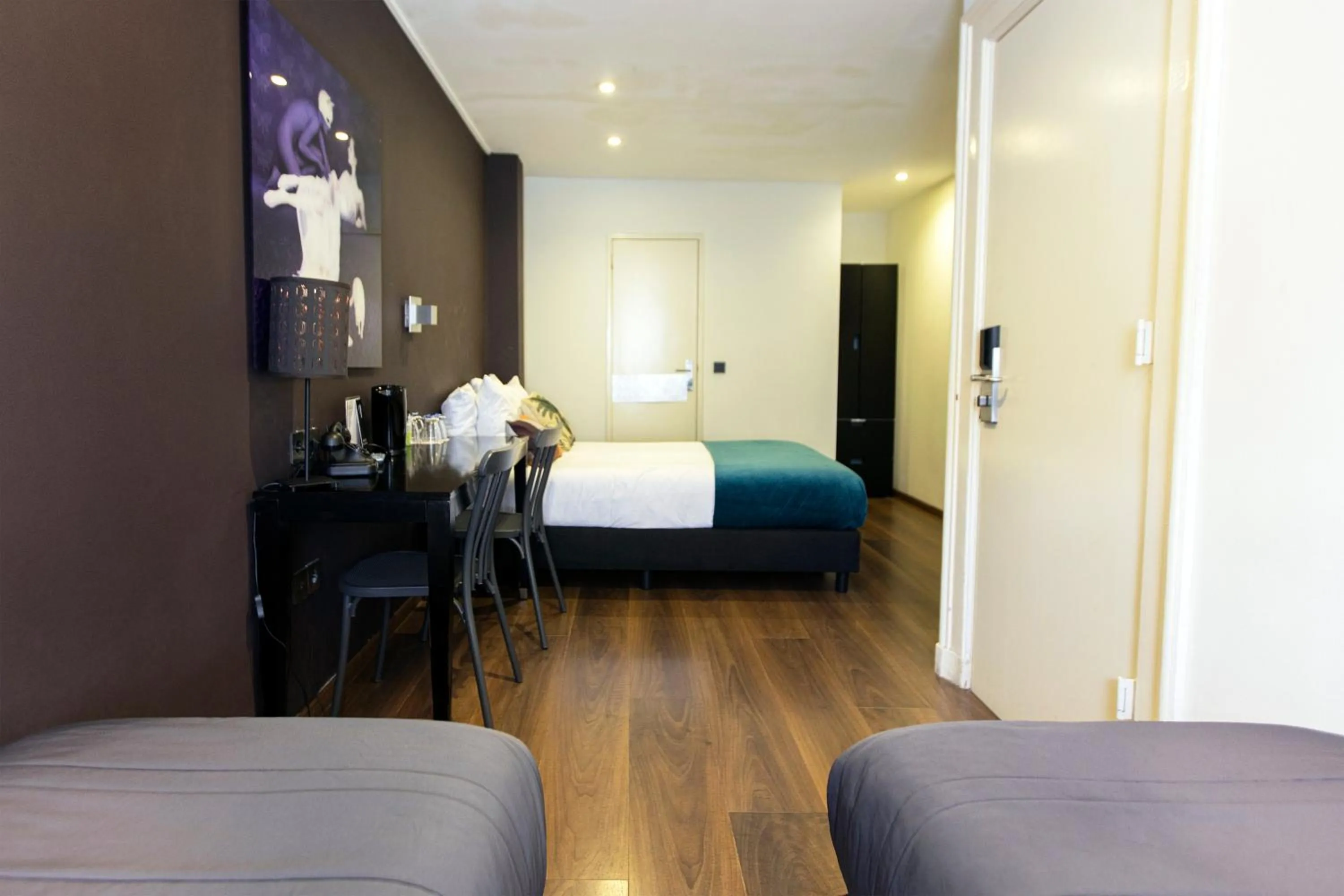 Bed in Quentin Amsterdam Hotel