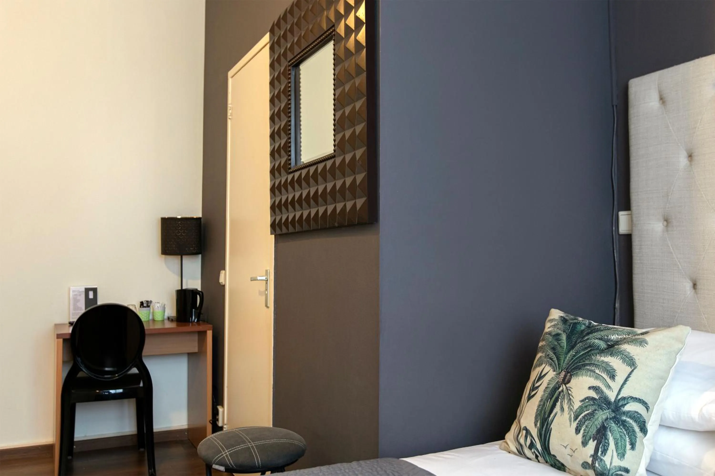 Decorative detail, Bed in Quentin Amsterdam Hotel