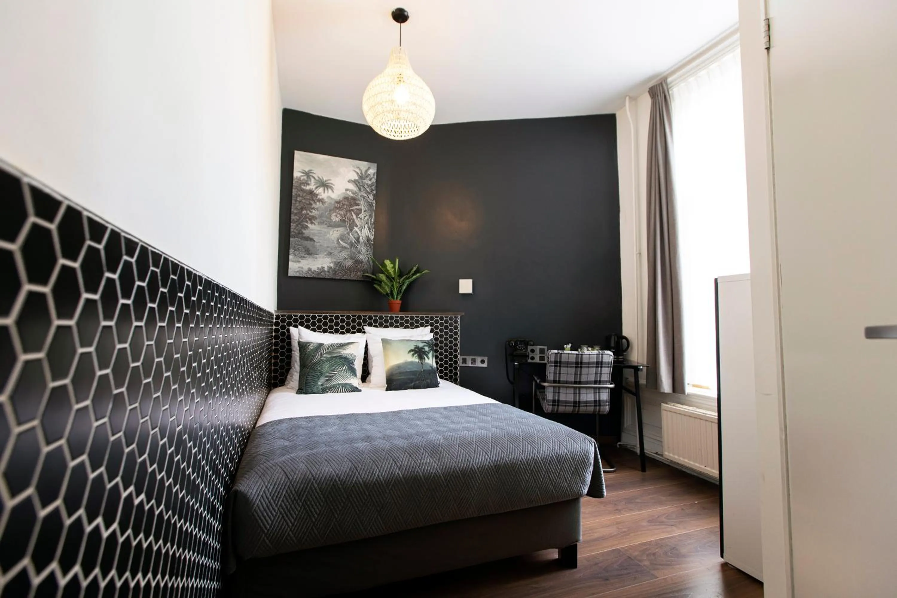 Bed in Quentin Amsterdam Hotel