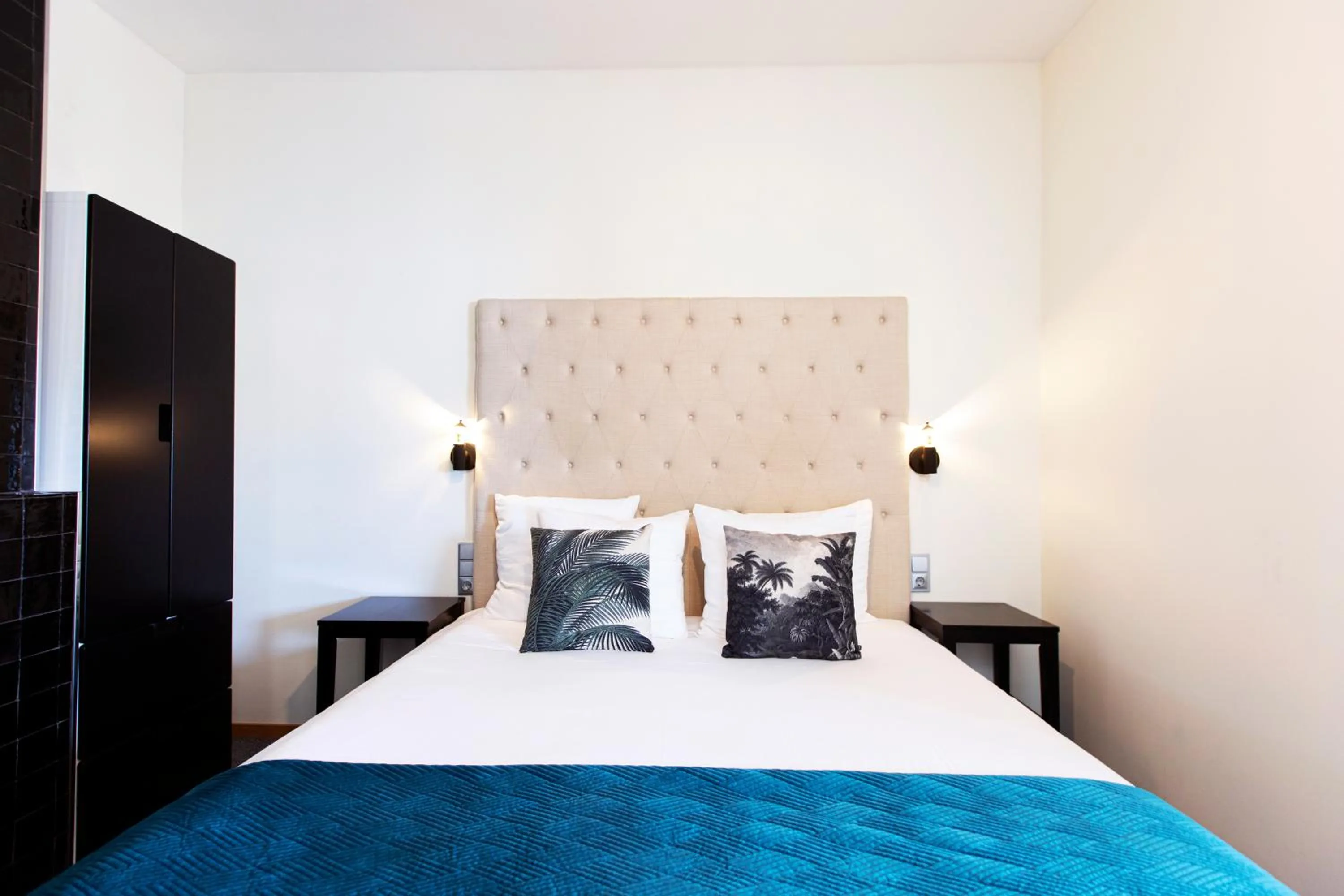 Bed in Quentin Amsterdam Hotel