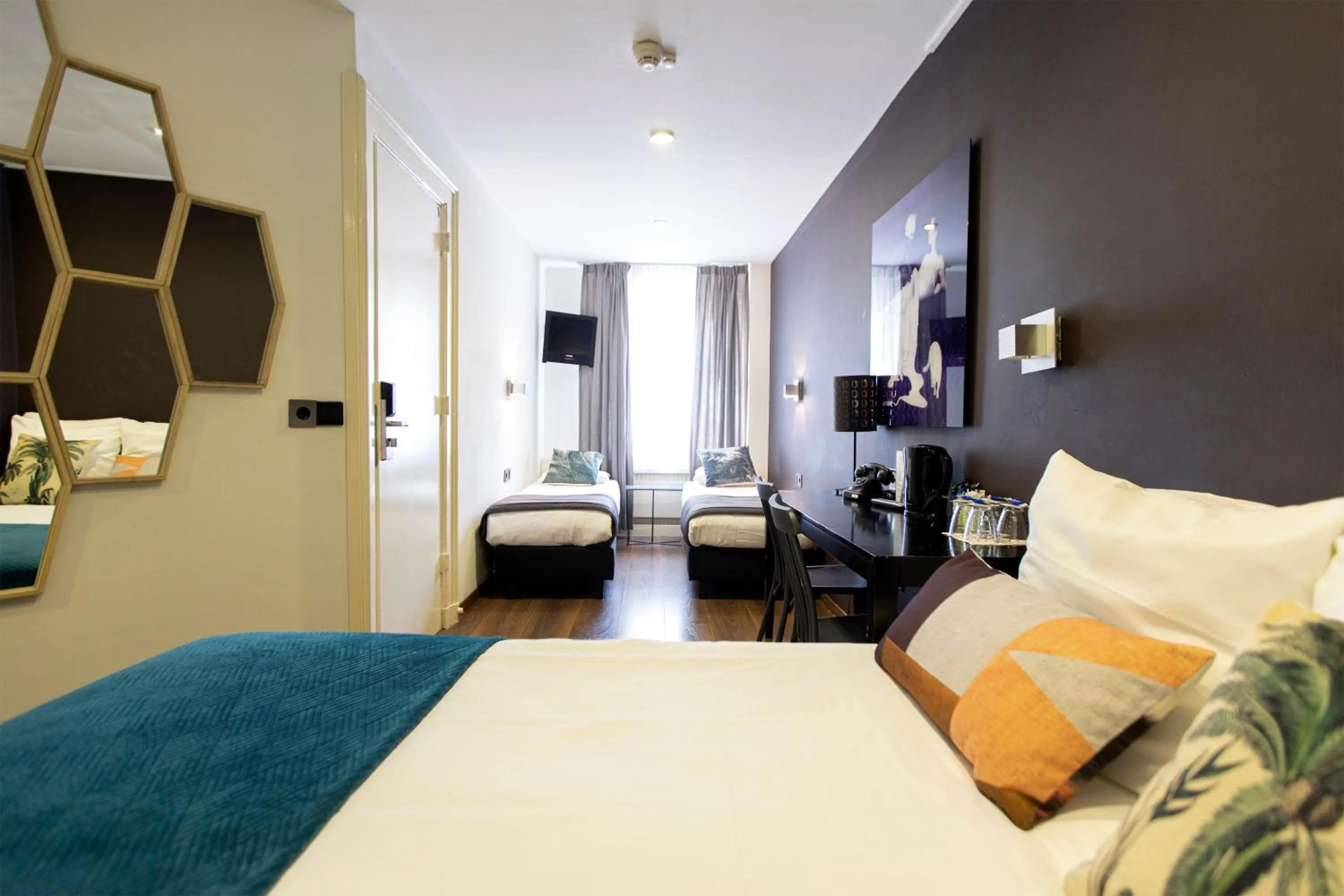 TV and multimedia, Bed in Quentin Amsterdam Hotel