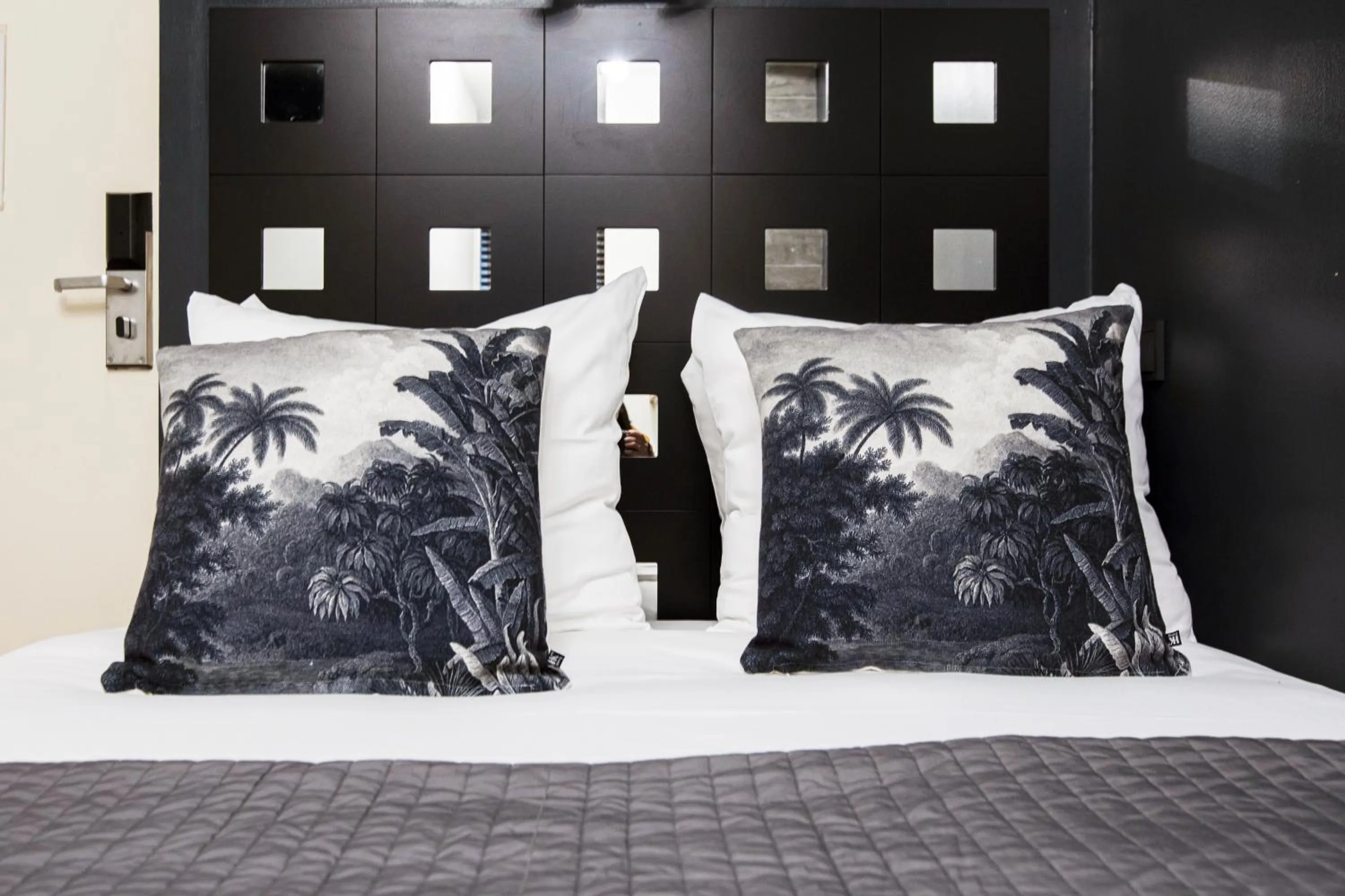 Bed in Quentin Amsterdam Hotel