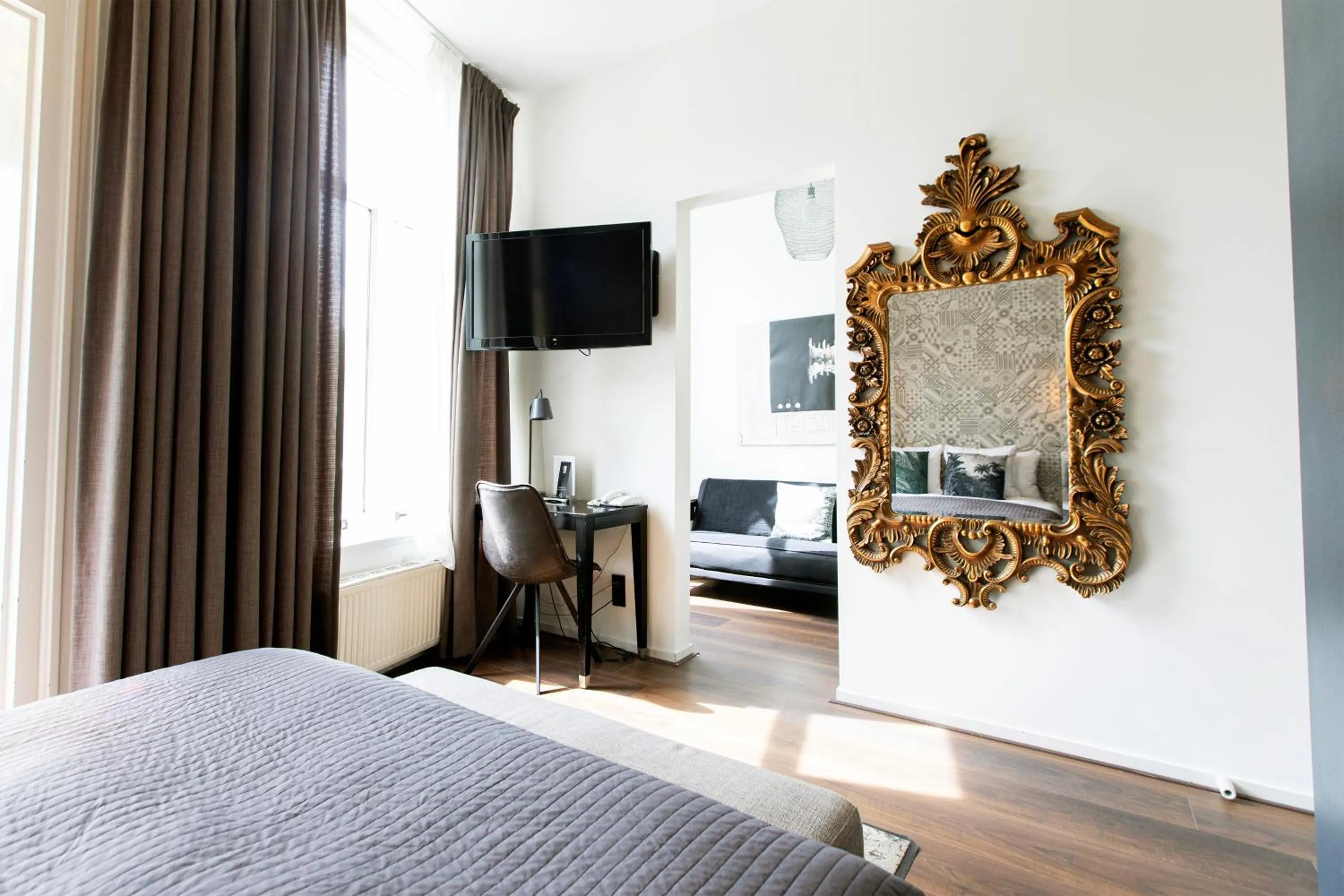 TV and multimedia, Bed in Quentin Amsterdam Hotel