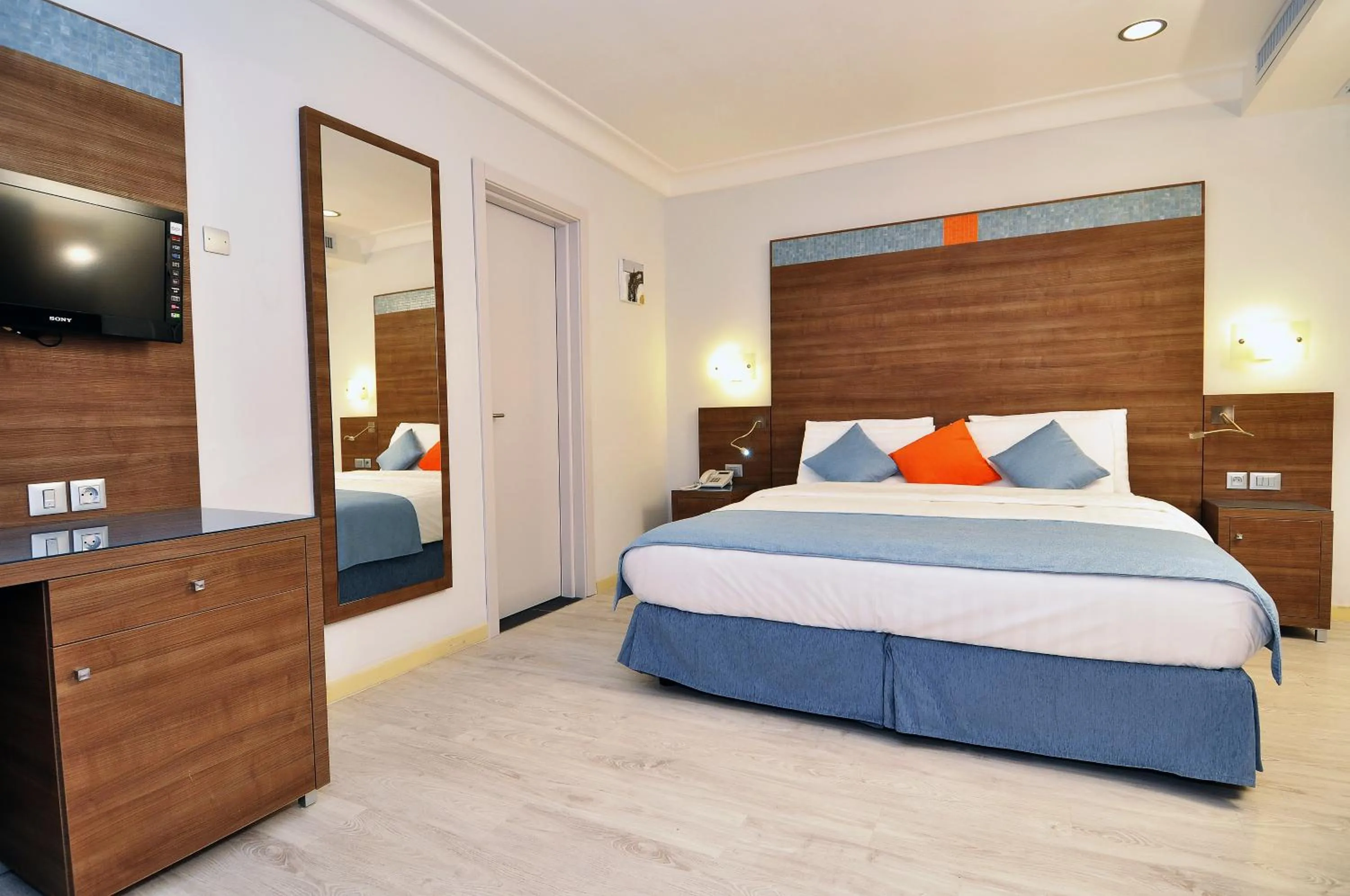 Bedroom in Benin Royal Hotel