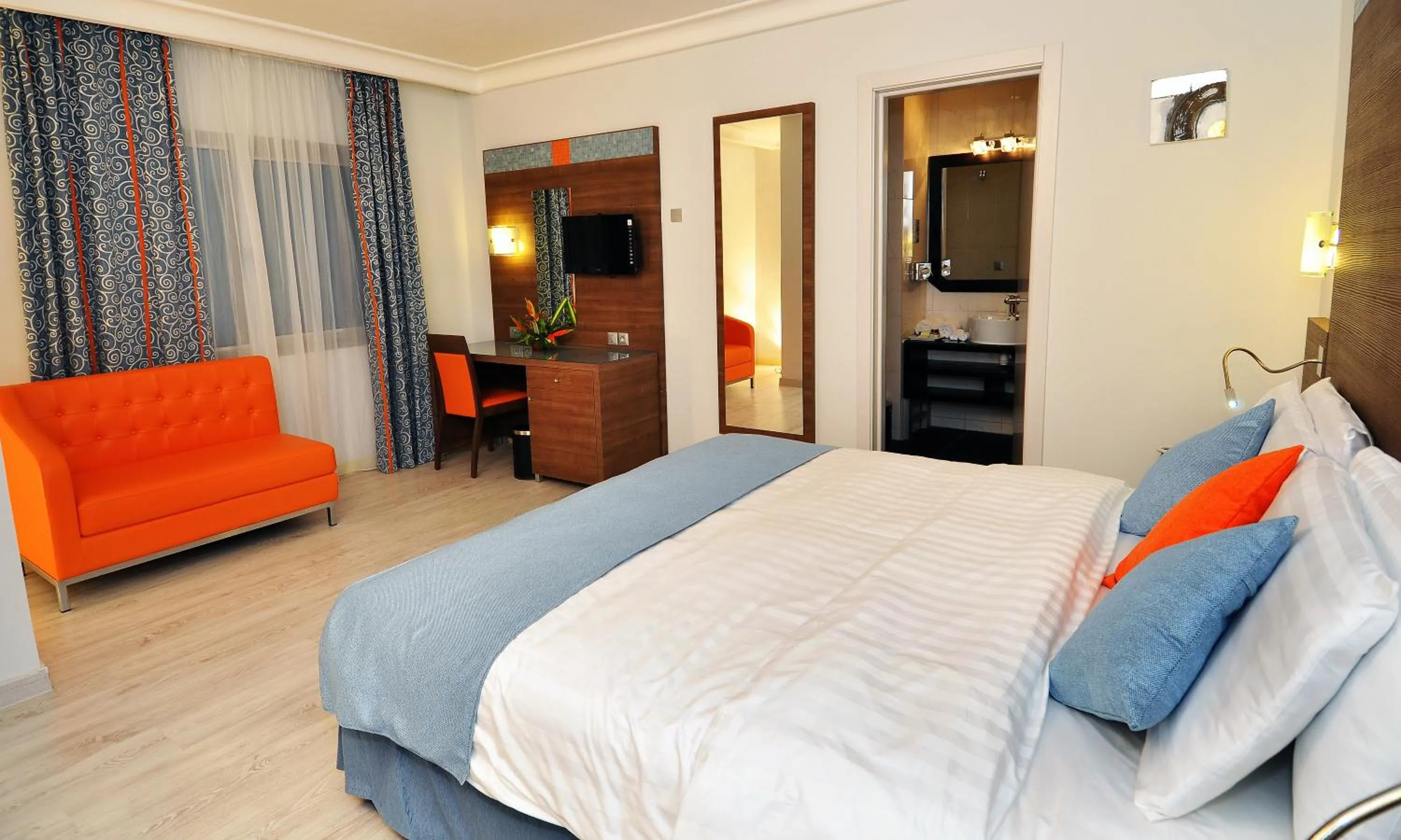 Bedroom in Benin Royal Hotel