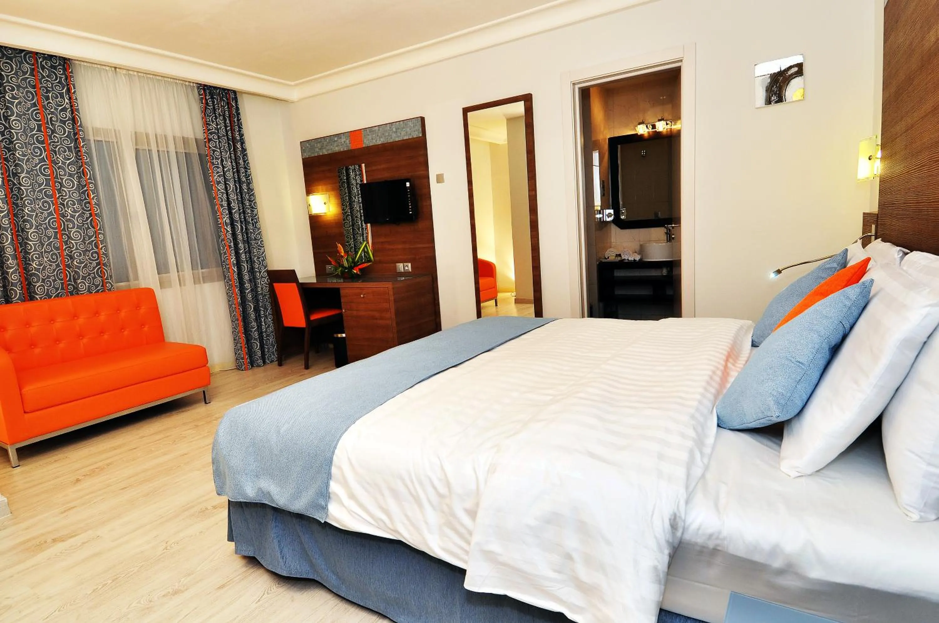 Bedroom in Benin Royal Hotel