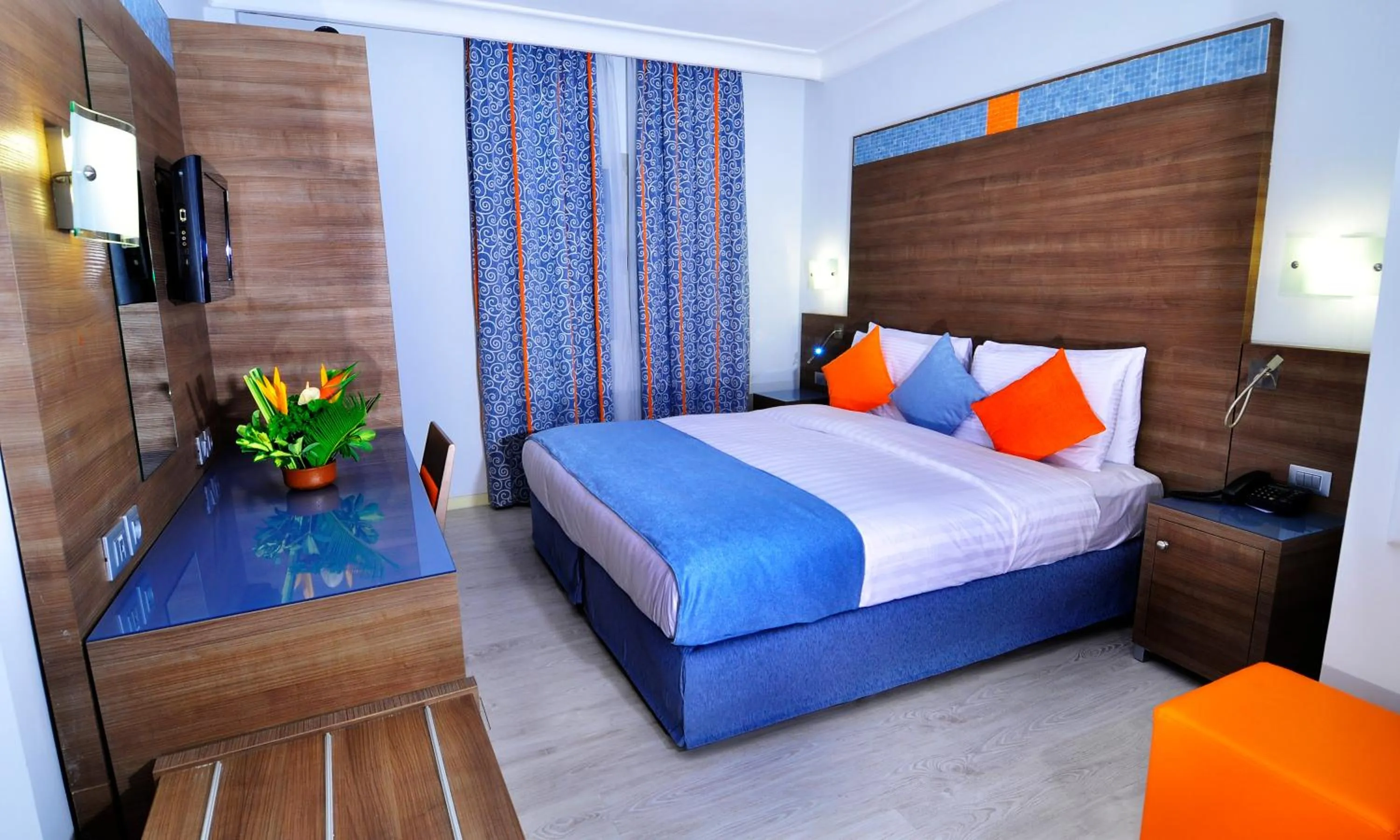 Bedroom in Benin Royal Hotel