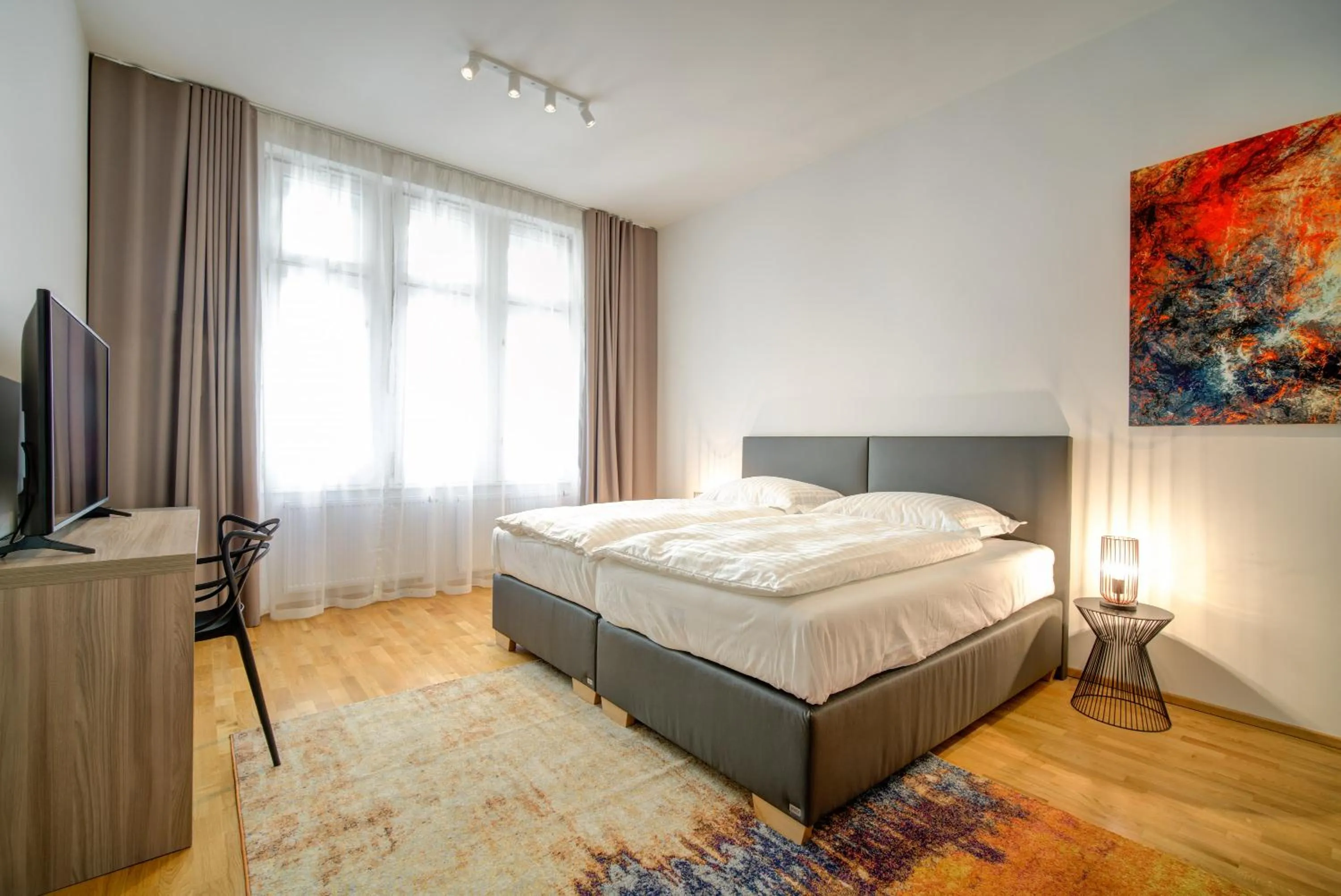 Bed in Bishop Apartments