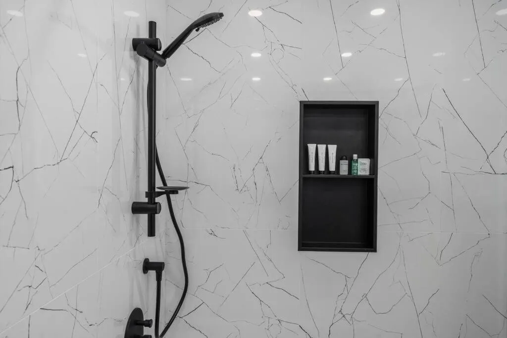 Shower in Downtown Luxe: Metro, King Bed, Parking, Sleeps 6