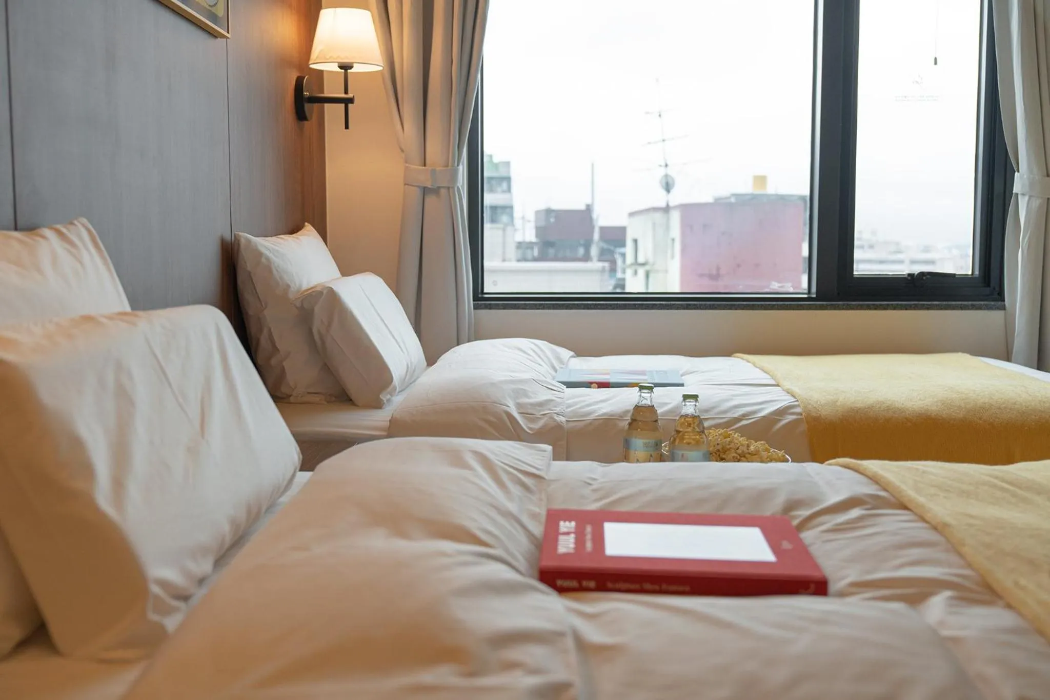 Bed in Nouvelle Hotel Seoul Itaewon by Aank
