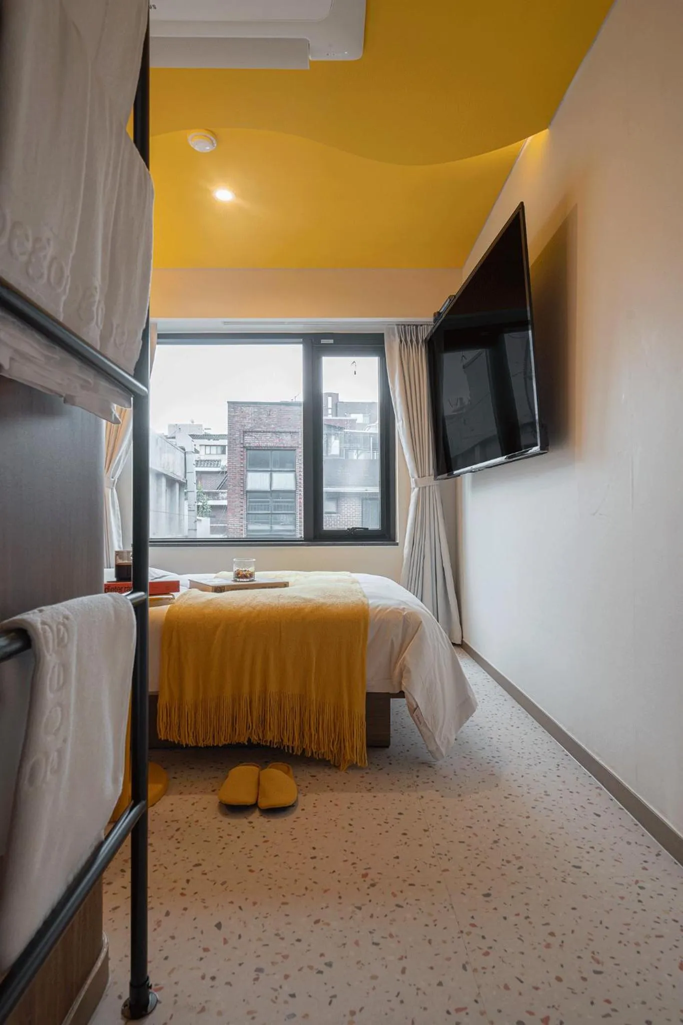 Bed in Nouvelle Hotel Seoul Itaewon by Aank