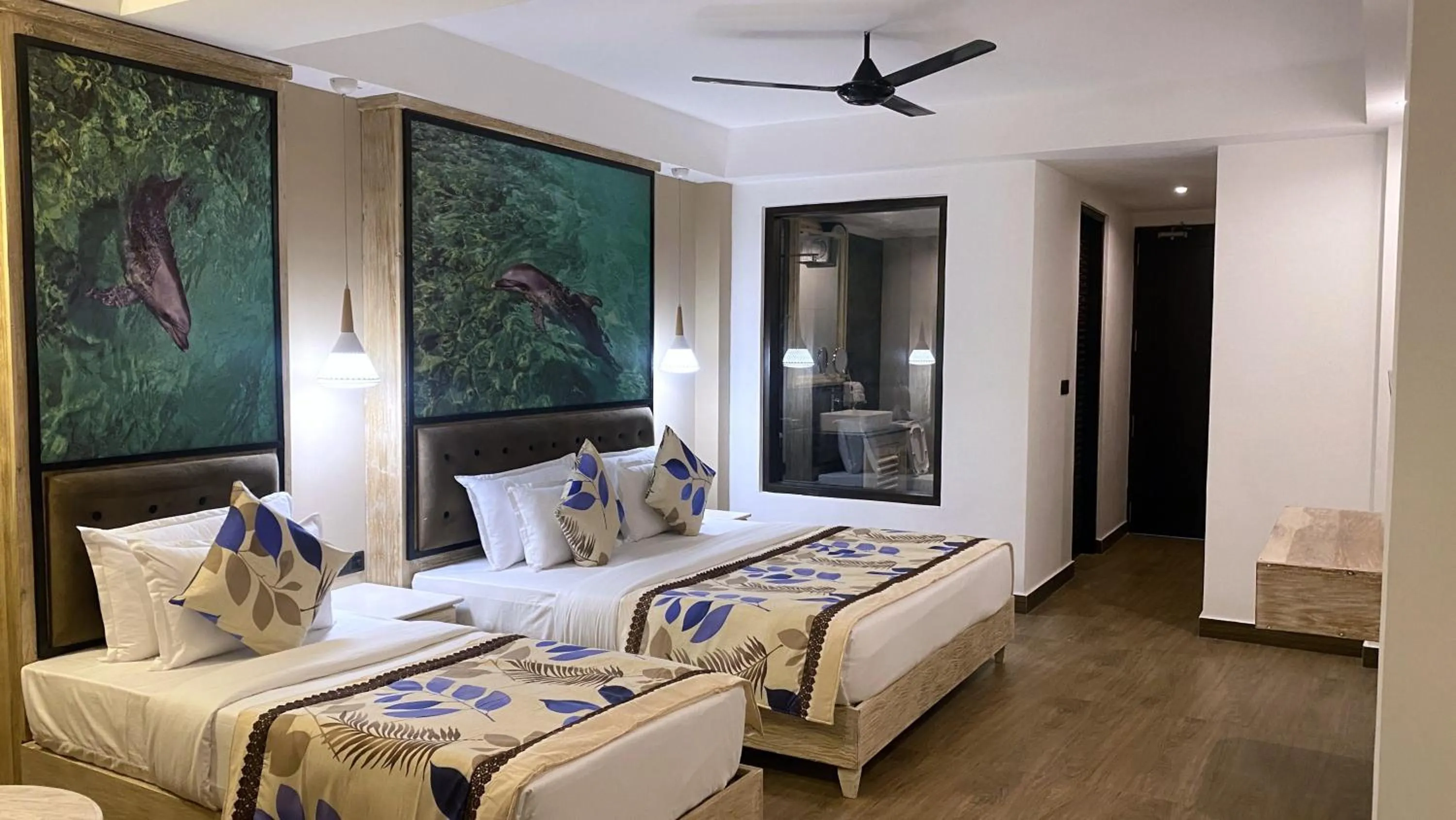 Bed in Emerald Bay Resort Mirissa