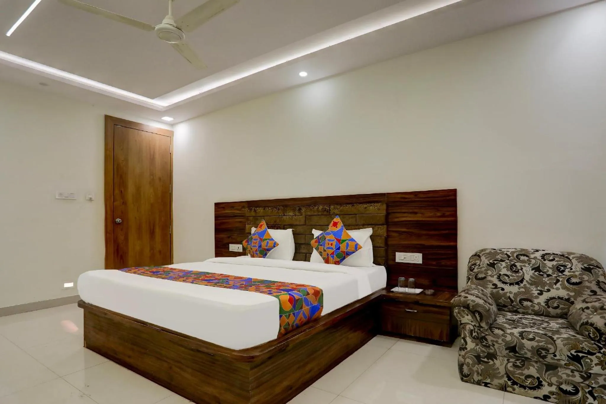 Bed in FabHotel Oriental