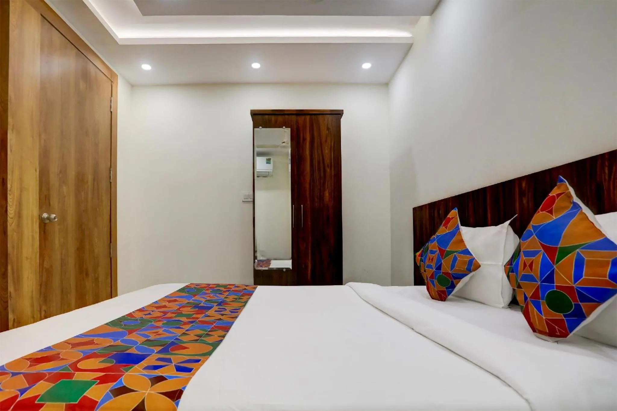 Bed in FabHotel Oriental