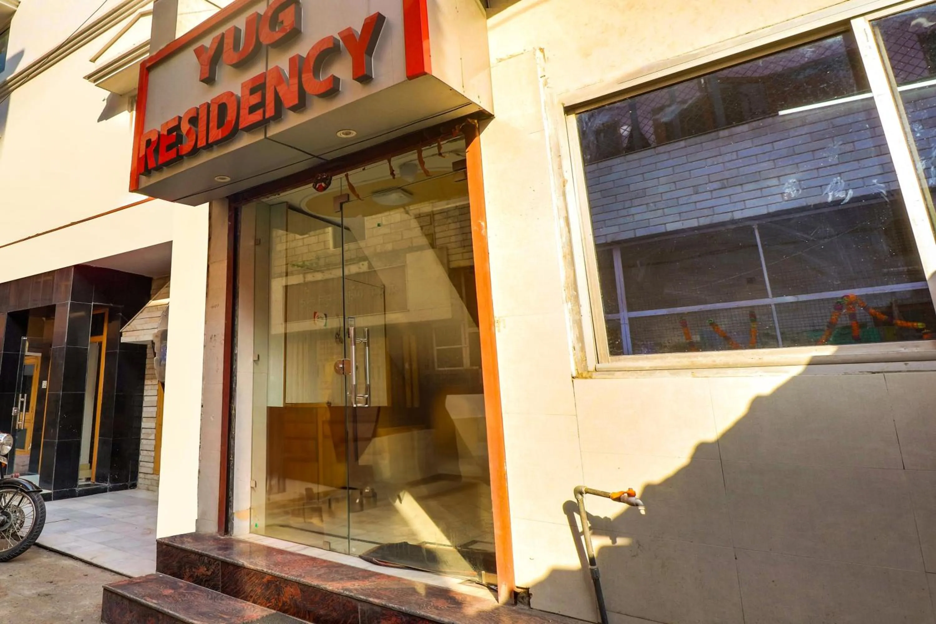 Facade/entrance in Hotel O by OYO Yug Residency