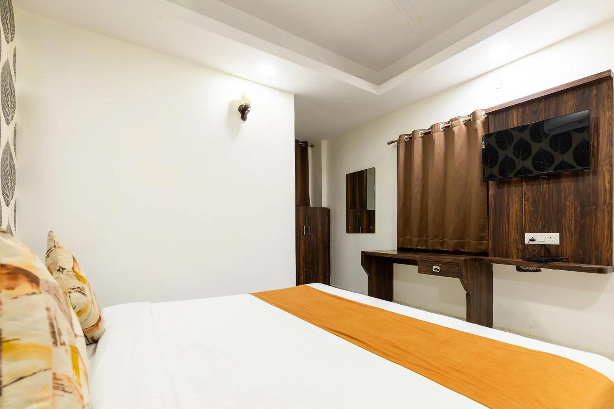 Bed in FabHotel Ocean Pearl