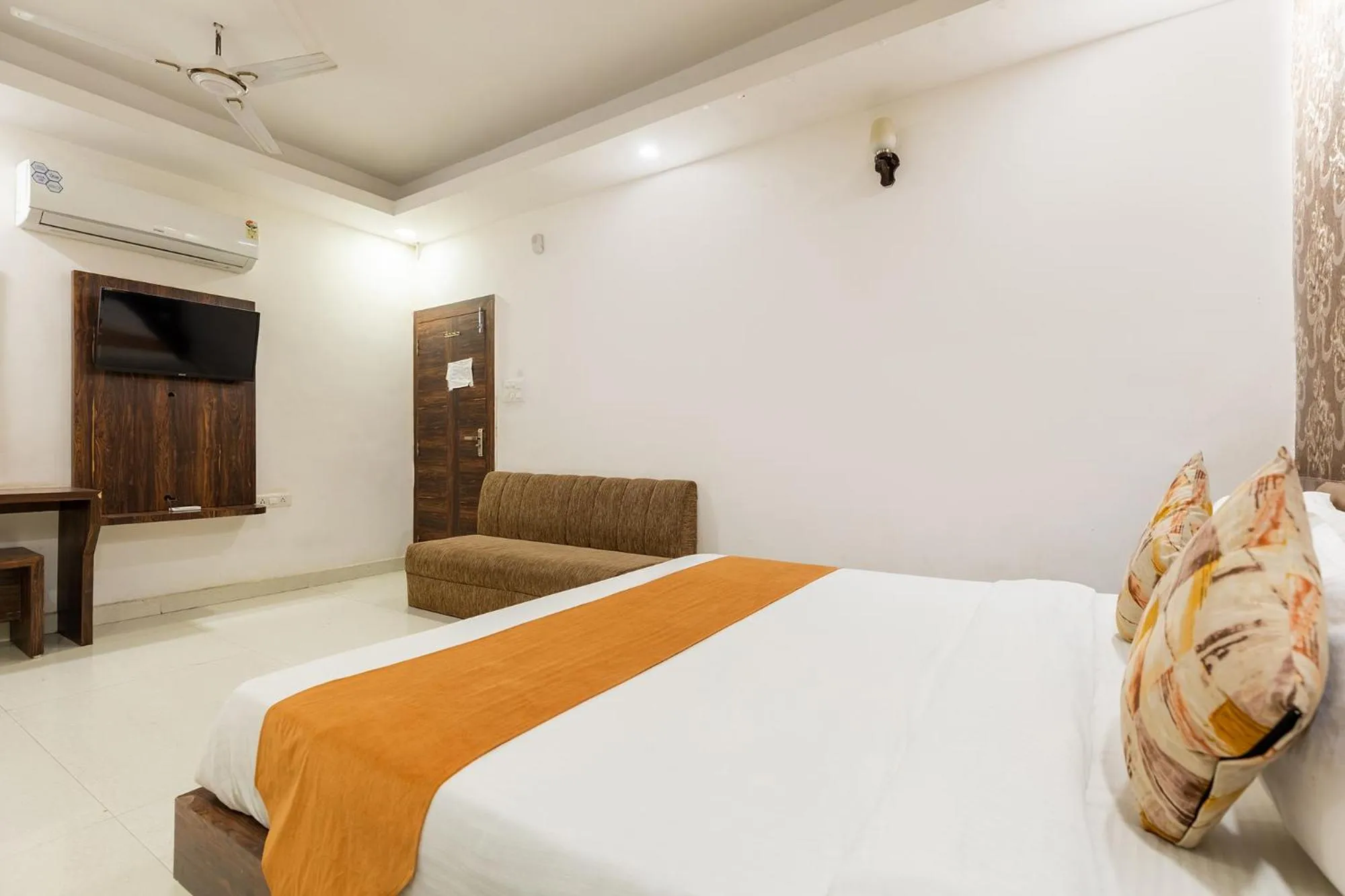 Bed in FabHotel Ocean Pearl