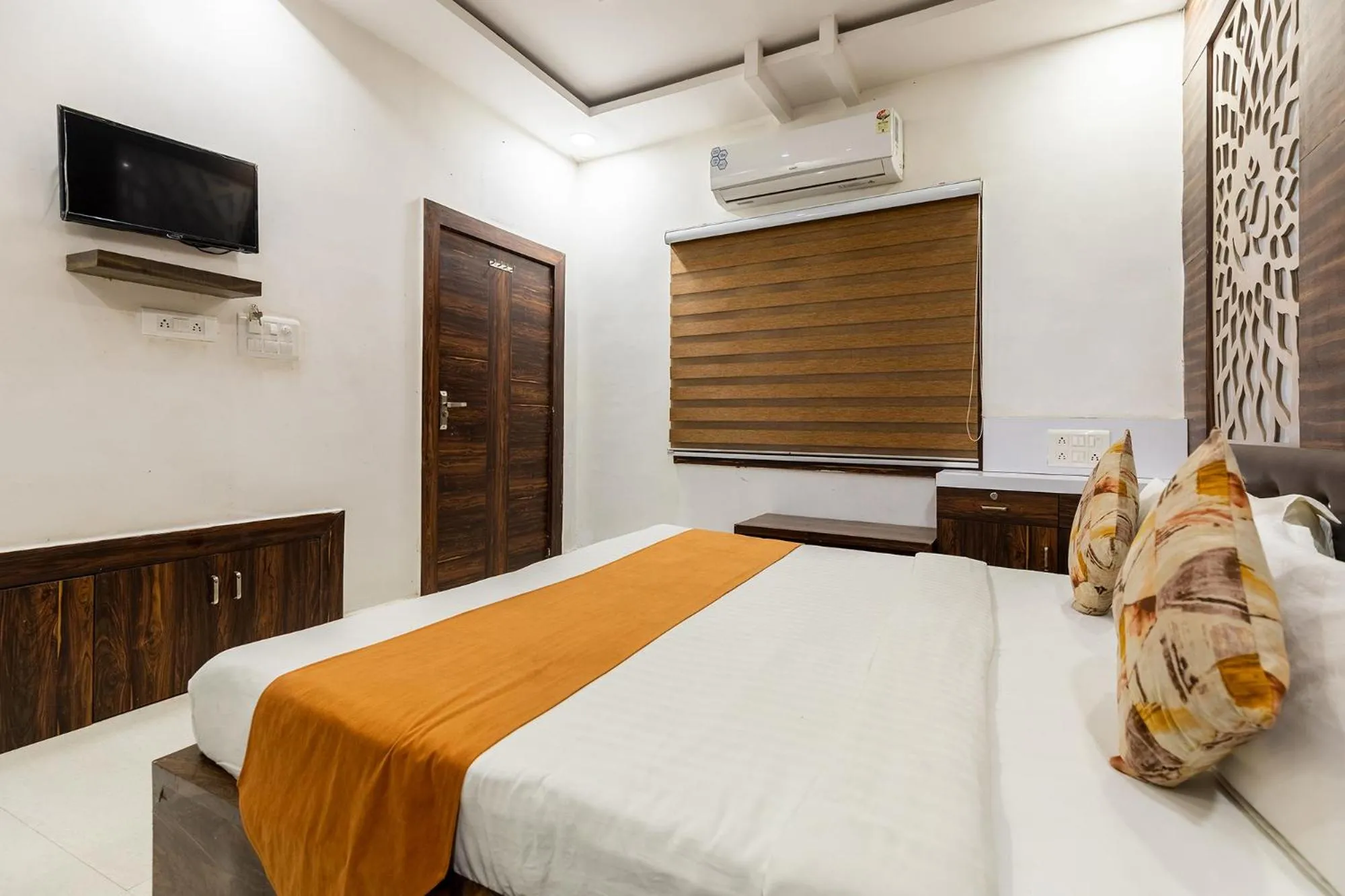 Bed in FabHotel Ocean Pearl