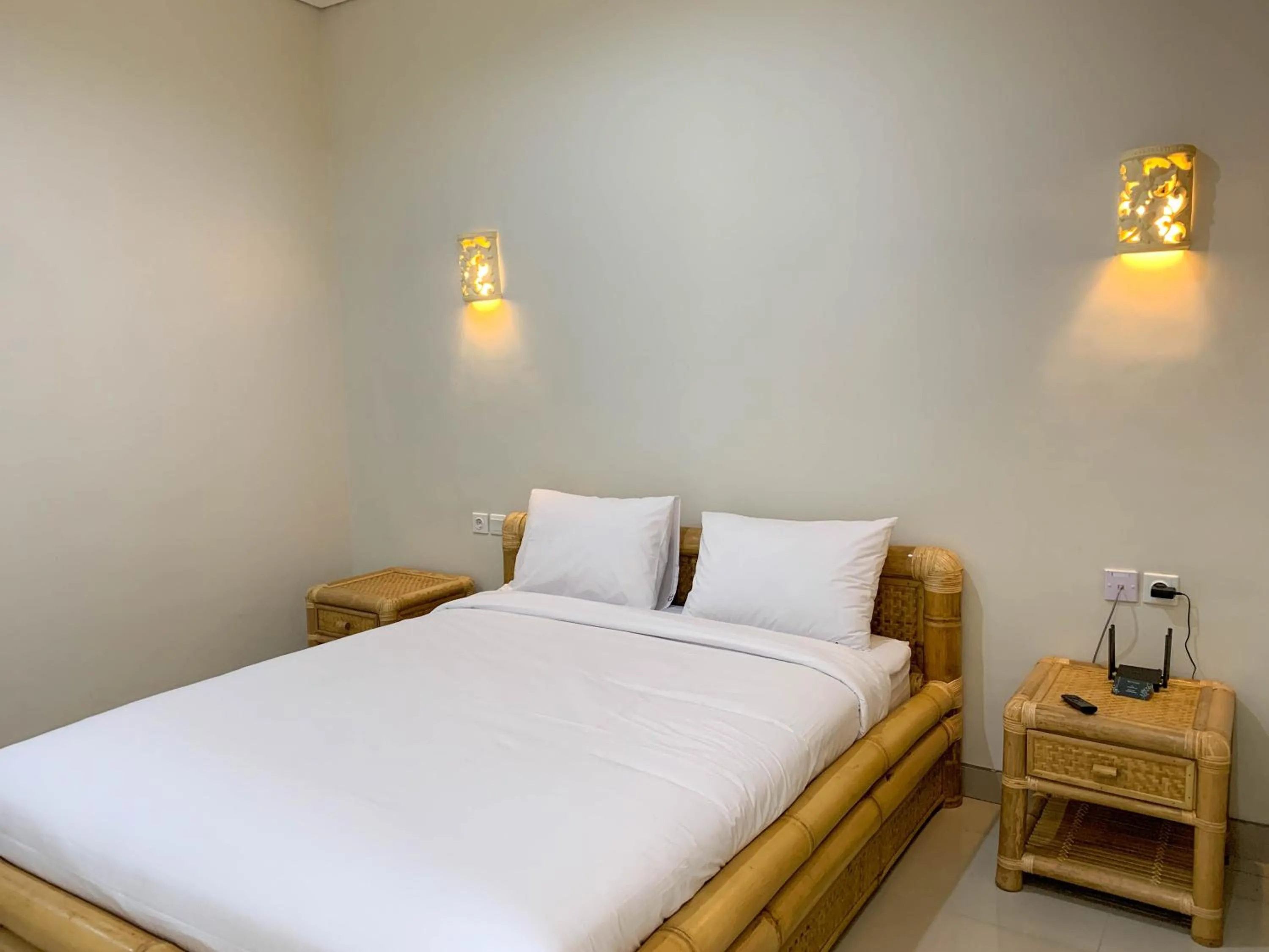 Bed in Candra Loka Studio & Apartment by The Loka