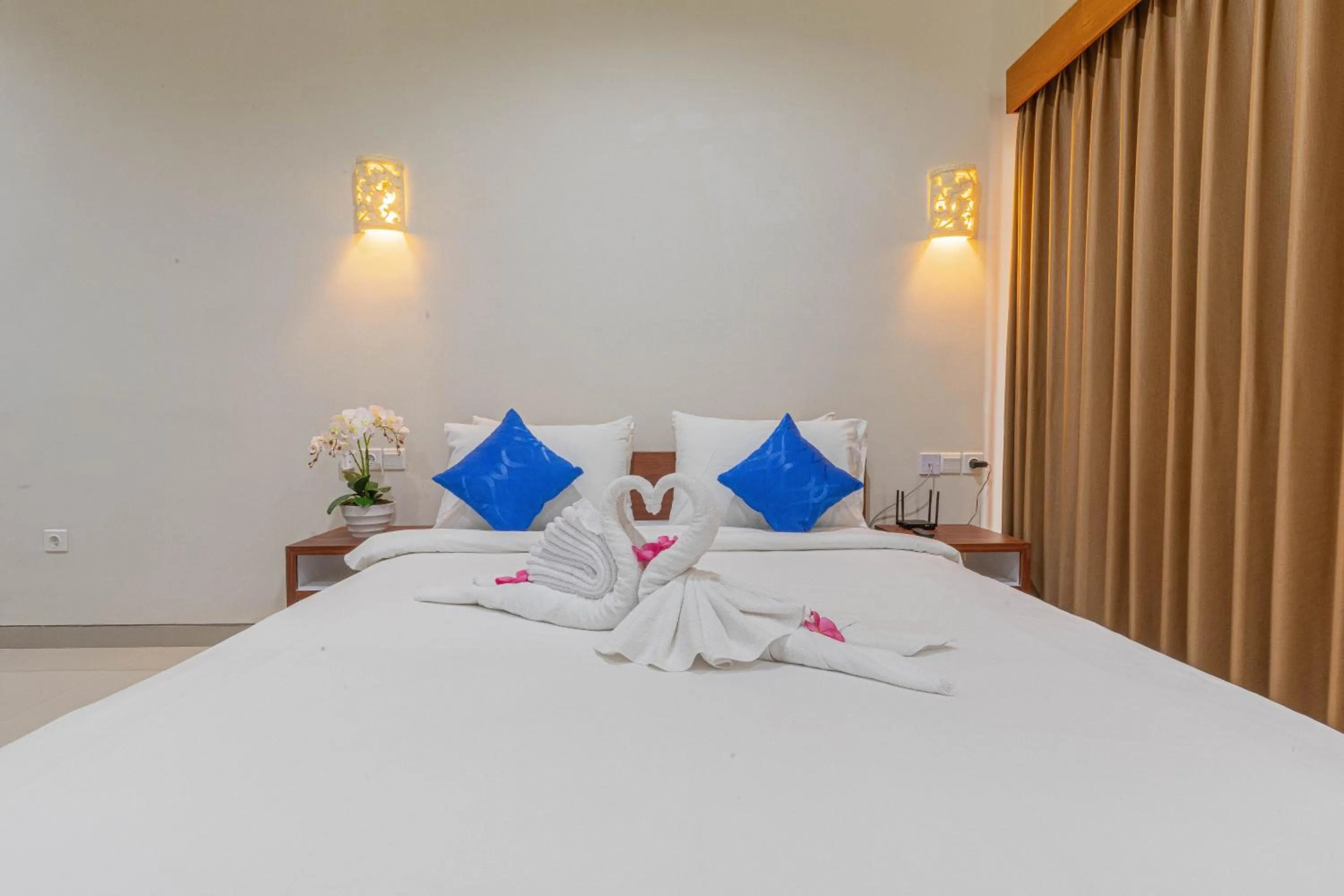 Bed in Candra Loka Studio & Apartment by The Loka