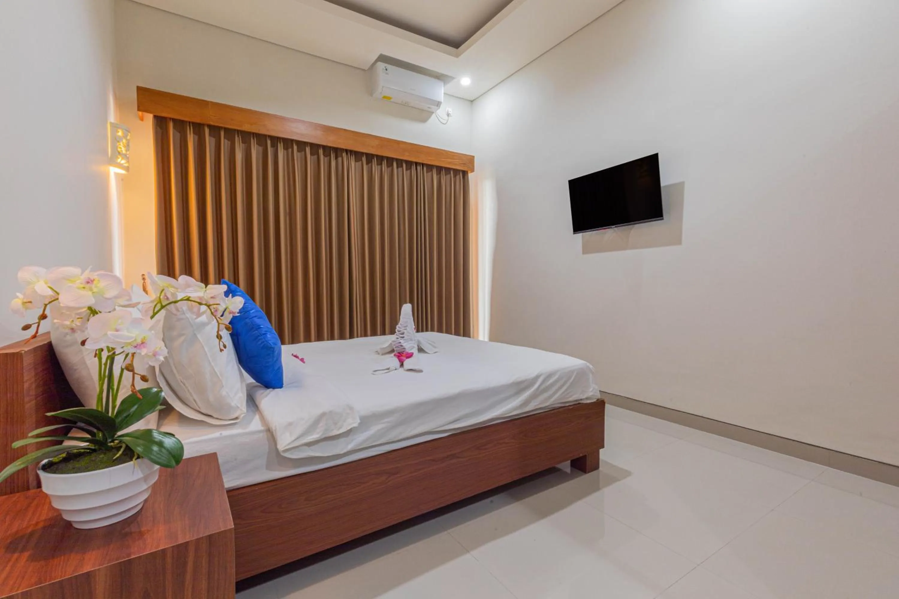 Bed in Candra Loka Studio & Apartment by The Loka